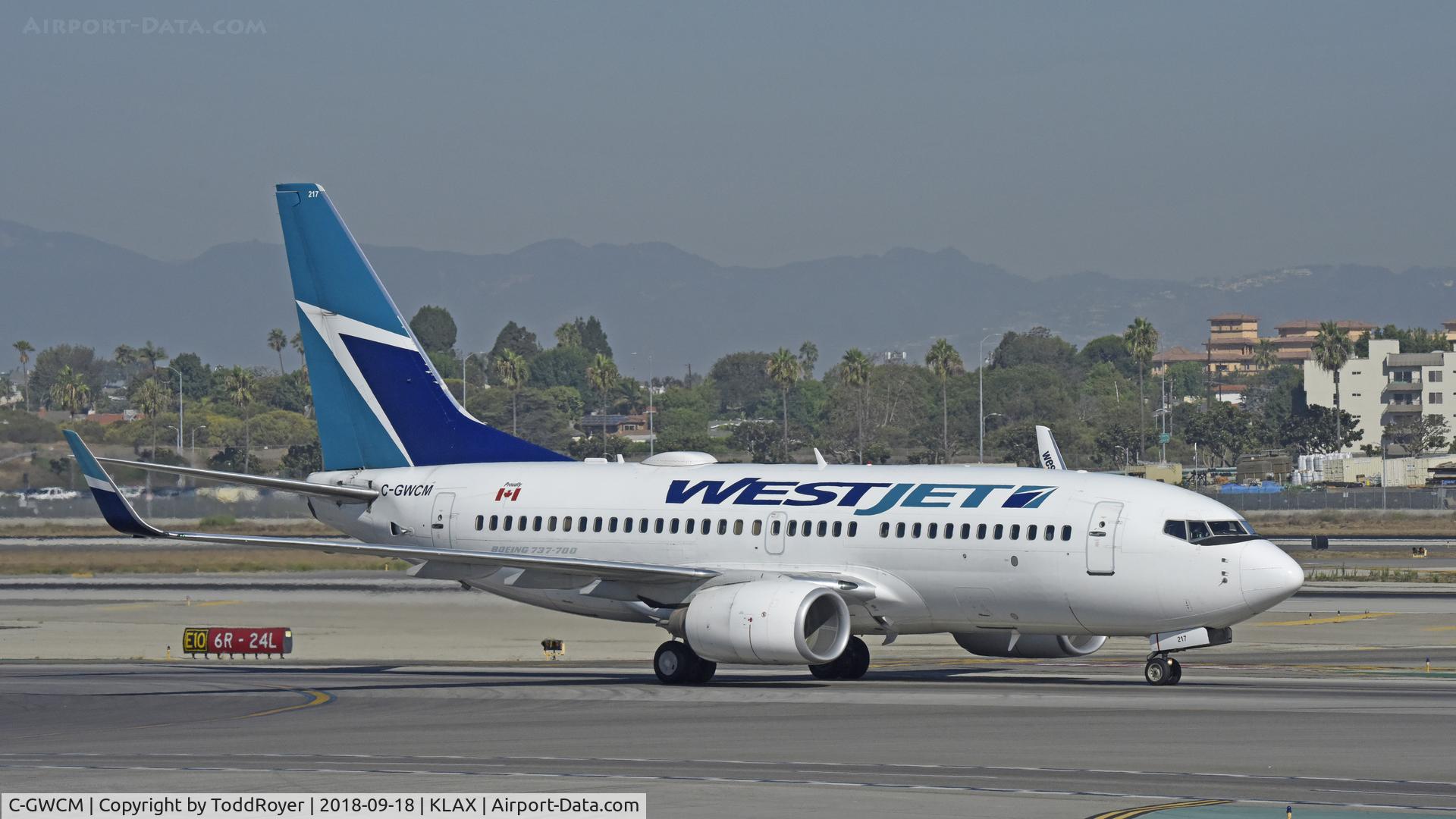 C-GWCM, 2003 Boeing 737-7CT C/N 32756, Taxiing for departure at LAX