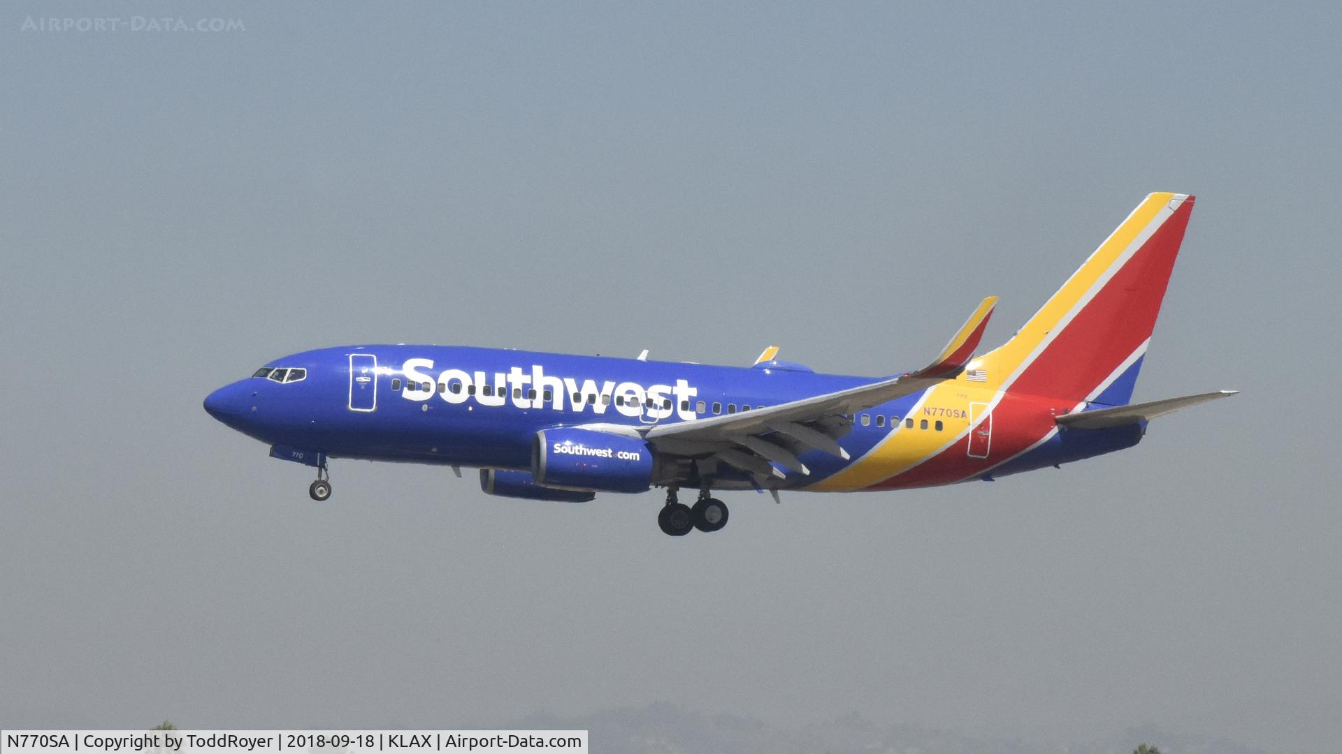 N770SA, 2000 Boeing 737-7H4 C/N 30589, Landing at LAX on 24R