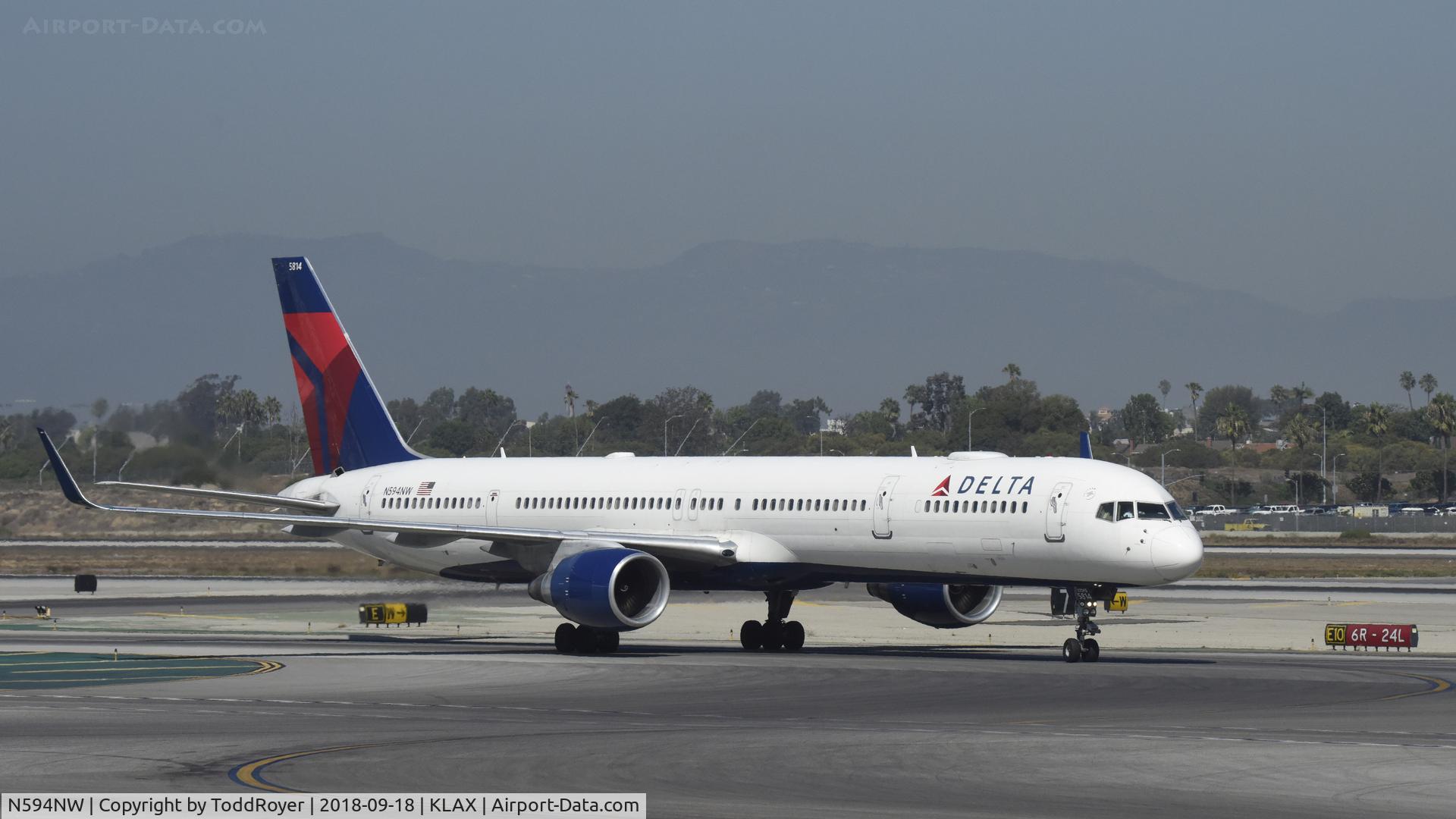 N594NW, 2003 Boeing 757-351 C/N 32994, Taxiing for departure at LAX  
