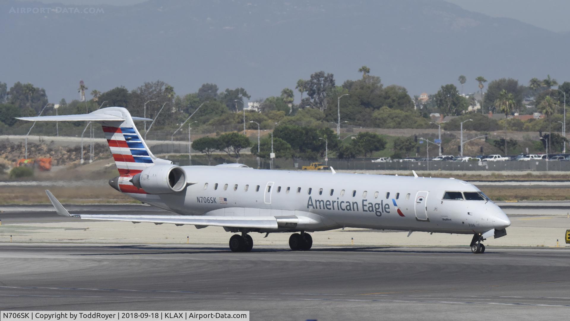 N706SK, 2004 Bombardier CRJ-701 (CL-600-2C10) Regional Jet C/N 10149, Taxiing at LAX