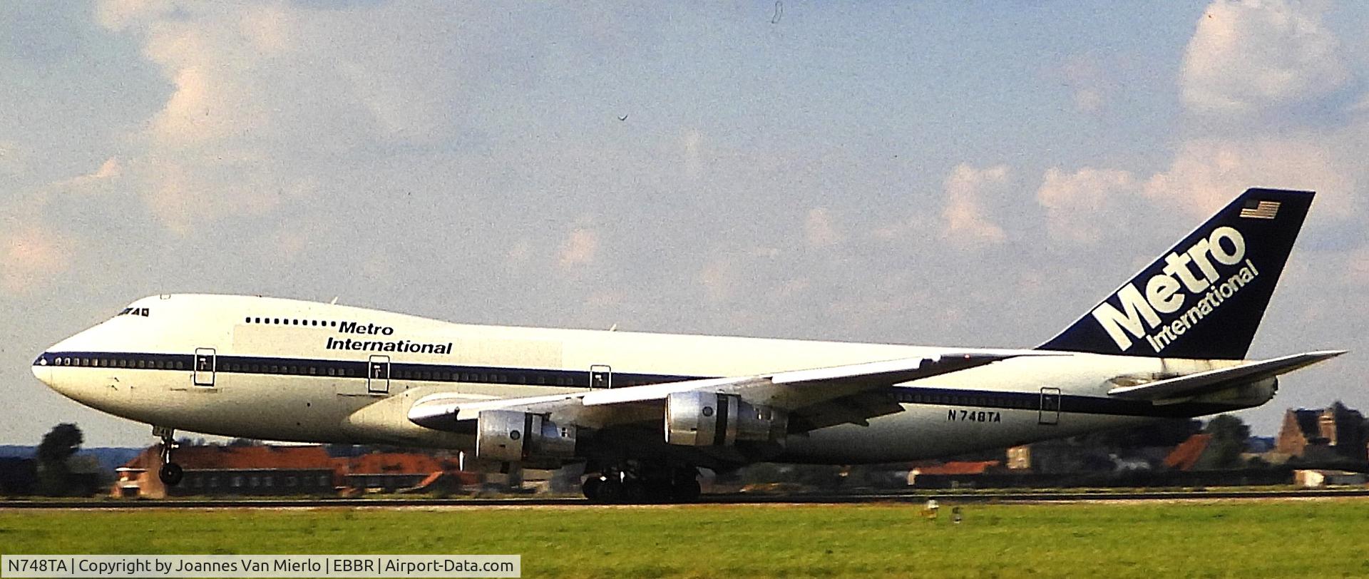 N748TA, 1973 Boeing 747-212B C/N 20713, ex-slide