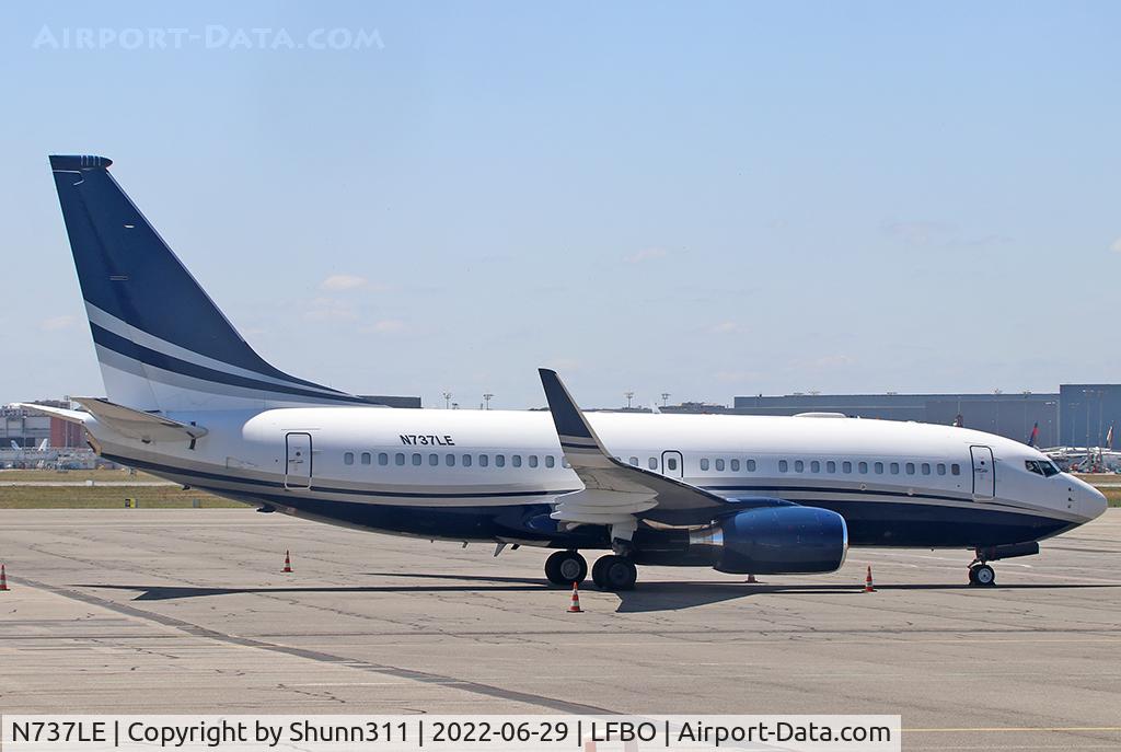 N737LE, 1999 Boeing 737-75V C/N 28579, Parked at the General Aviation area...
