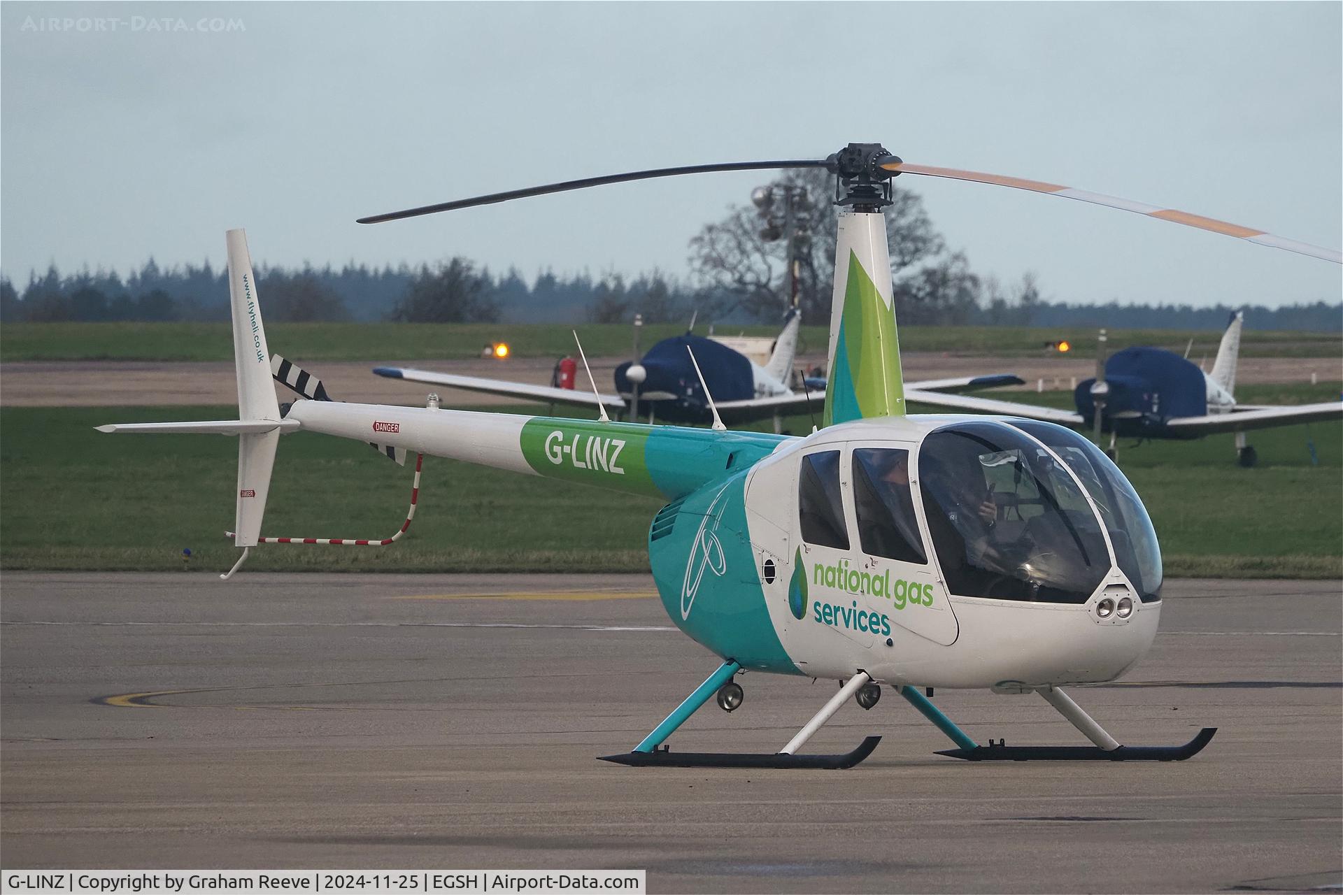 G-LINZ, 2007 Robinson R44 Raven II C/N 11911, Parked at Norwich.