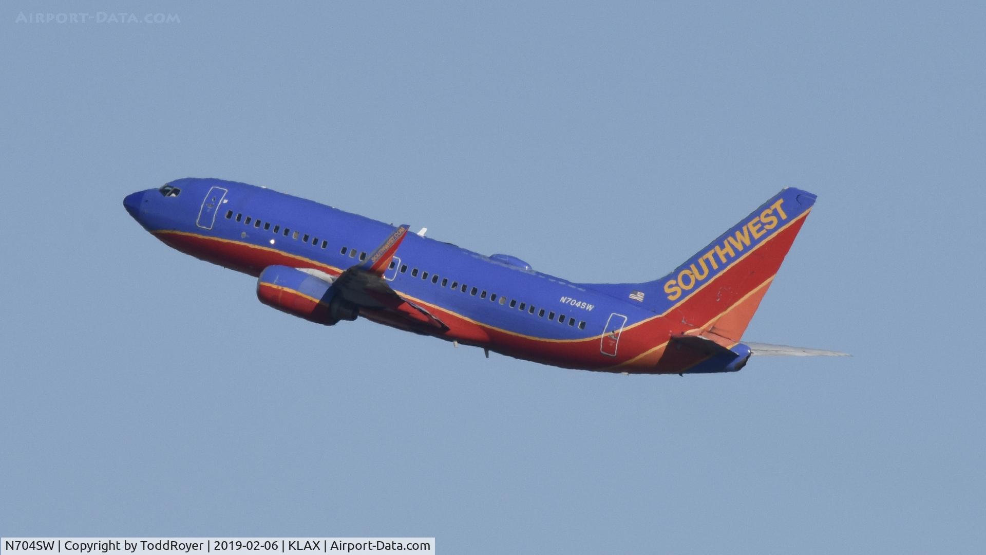 N704SW, 1998 Boeing 737-7H4 C/N 27838, Departing LAX on 24L