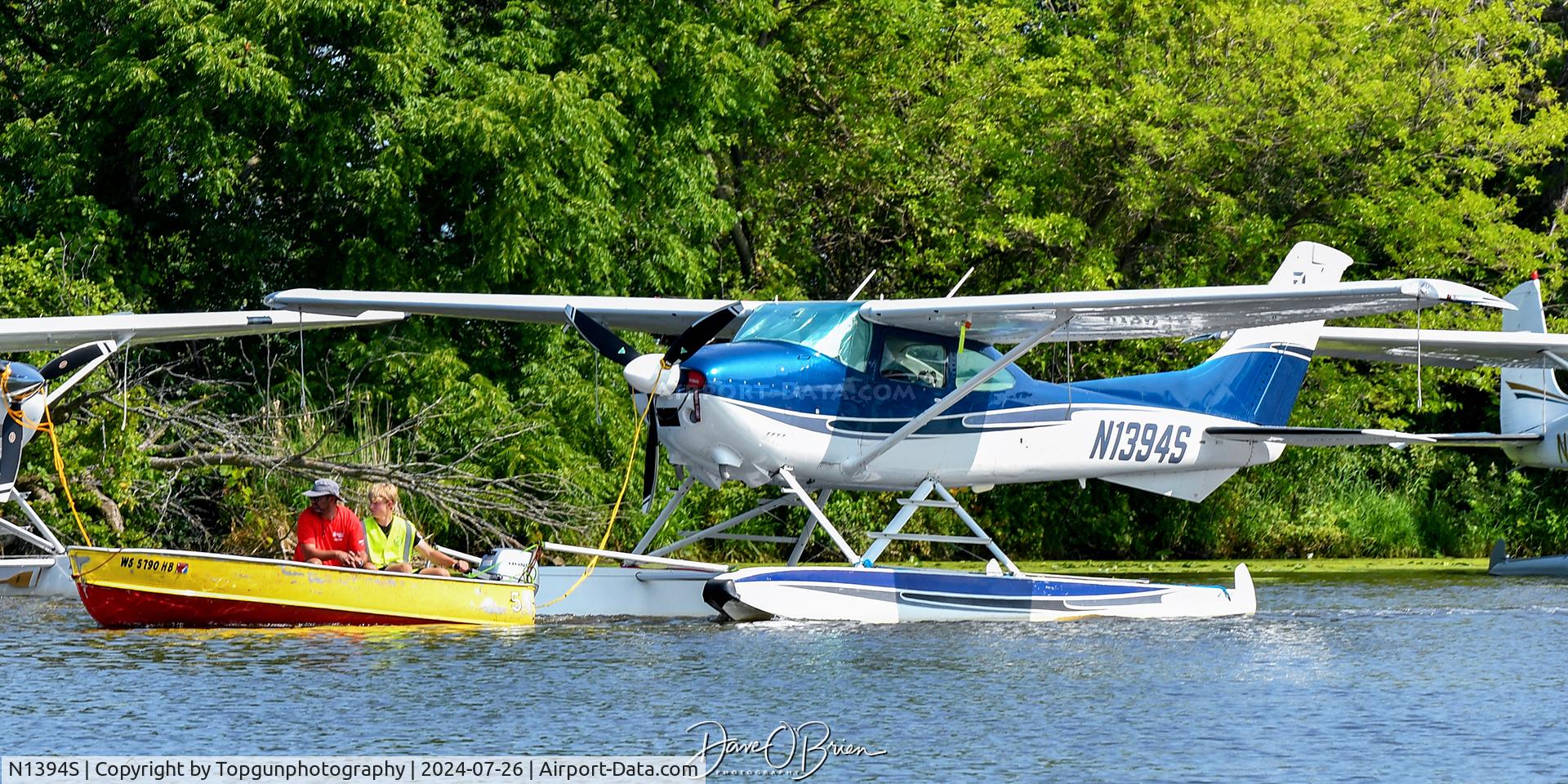 N1394S, 1976 Cessna 182P Skylane C/N 18264955, Floatplane base crew towing to the docks