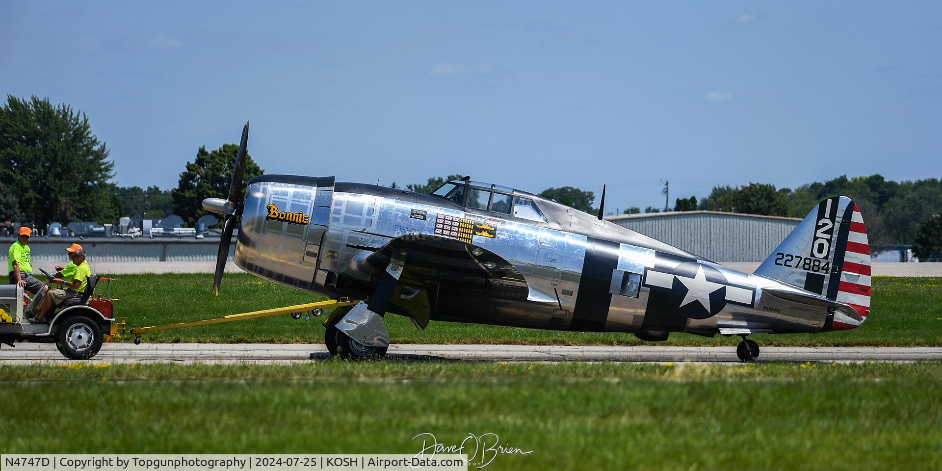 N4747D, 1942 Republic P-47D Thunderbolt C/N 2695-1771, P-47D being towed to the center ramp