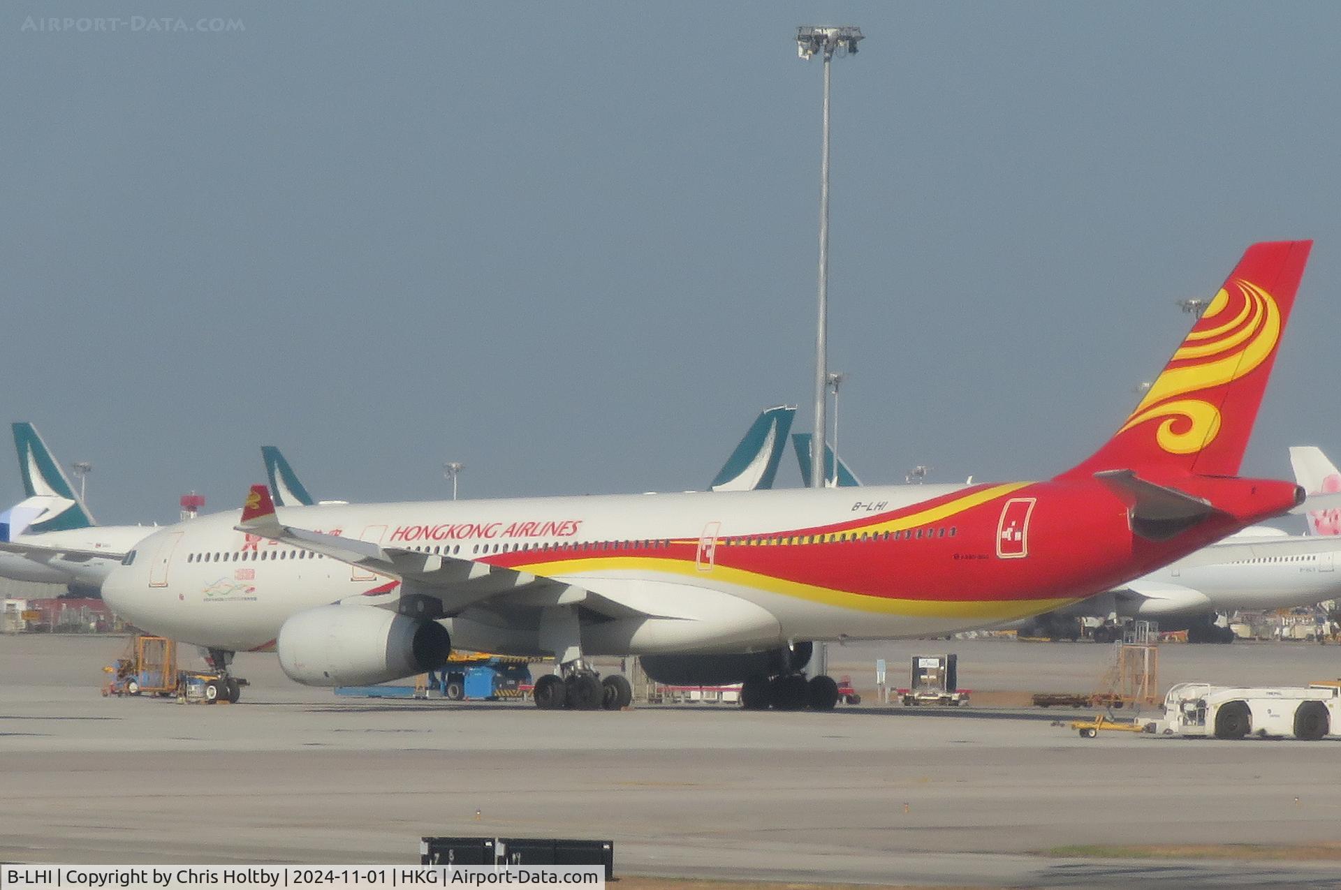 B-LHI, 2015 Airbus A330-300 C/N 1677, On stand at Hong Kong International