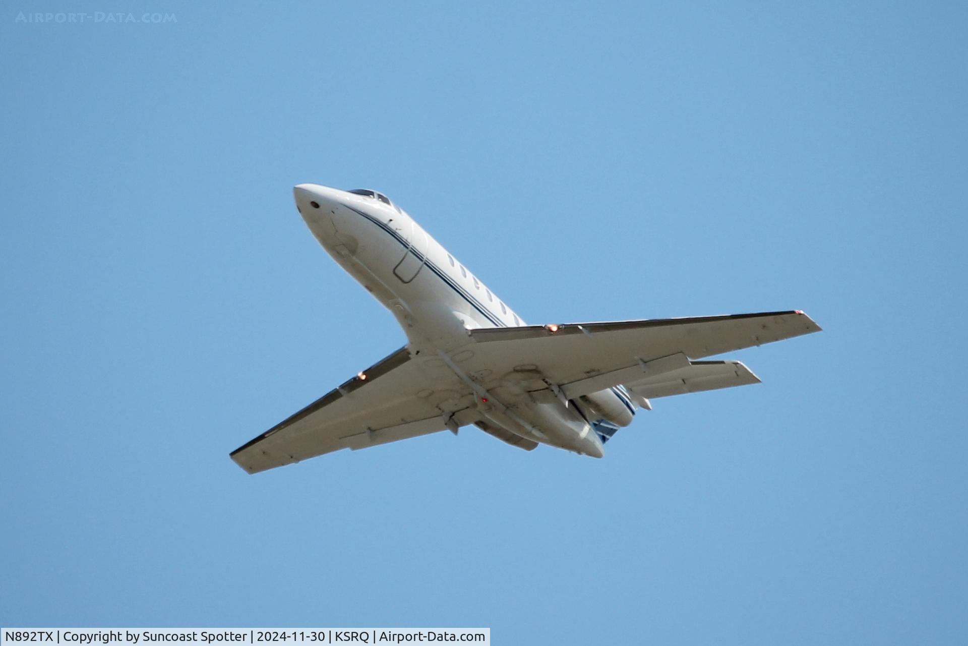 N892TX, 2002 Hawker 800XP C/N 258592, Hawker 892TX departs Runway 32 at Sarasota-Bradenton International Airport enroute to Lynden Pindling International Airport