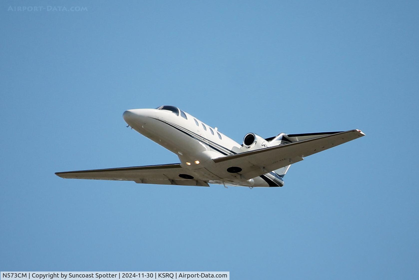 N573CM, 1999 Cessna 525 CitationJet CJ1 C/N 525-0352, Citation 573CM departs Runway 32 at Sarasota-Bradenton International Airport enroute to Lakefront Airport