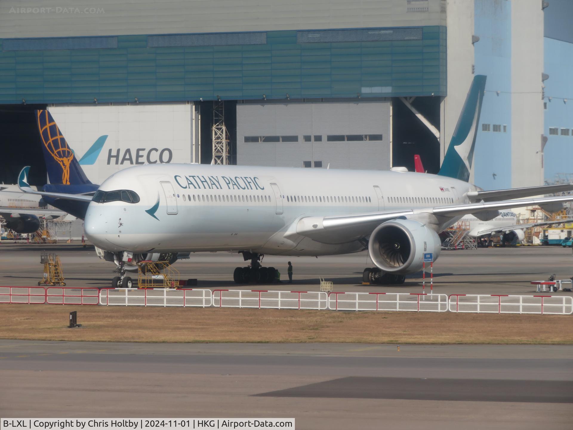 B-LXL, 2019 Airbus A350-1041 C/N 306, Parked at Hong Kong International