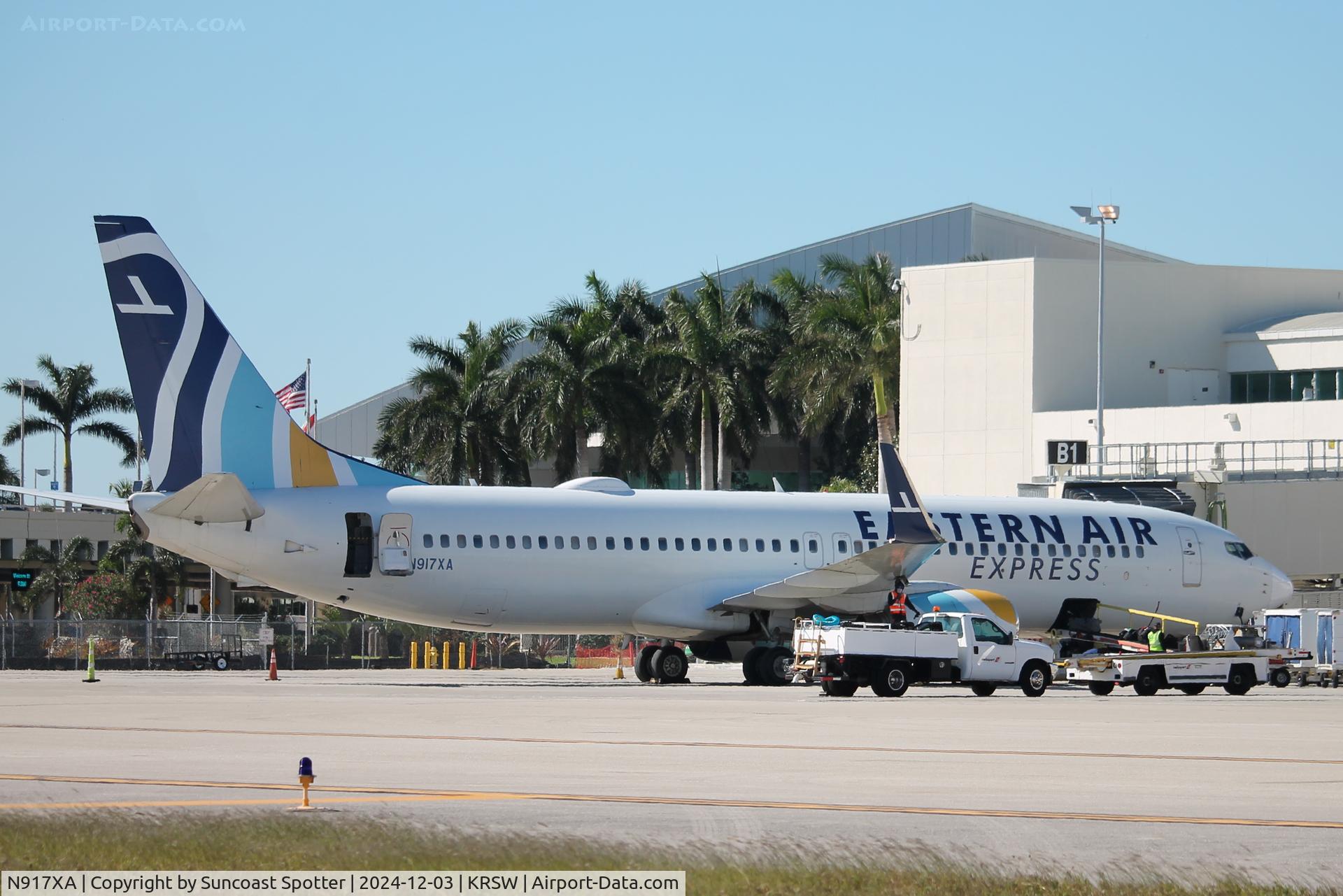 N917XA, 2002 Boeing 737-86J C/N 32917, Eastern Air Express Flight 2150 sits at Gate B1 at Southwest Florida International Airport following flight from Jose Marti International Airport