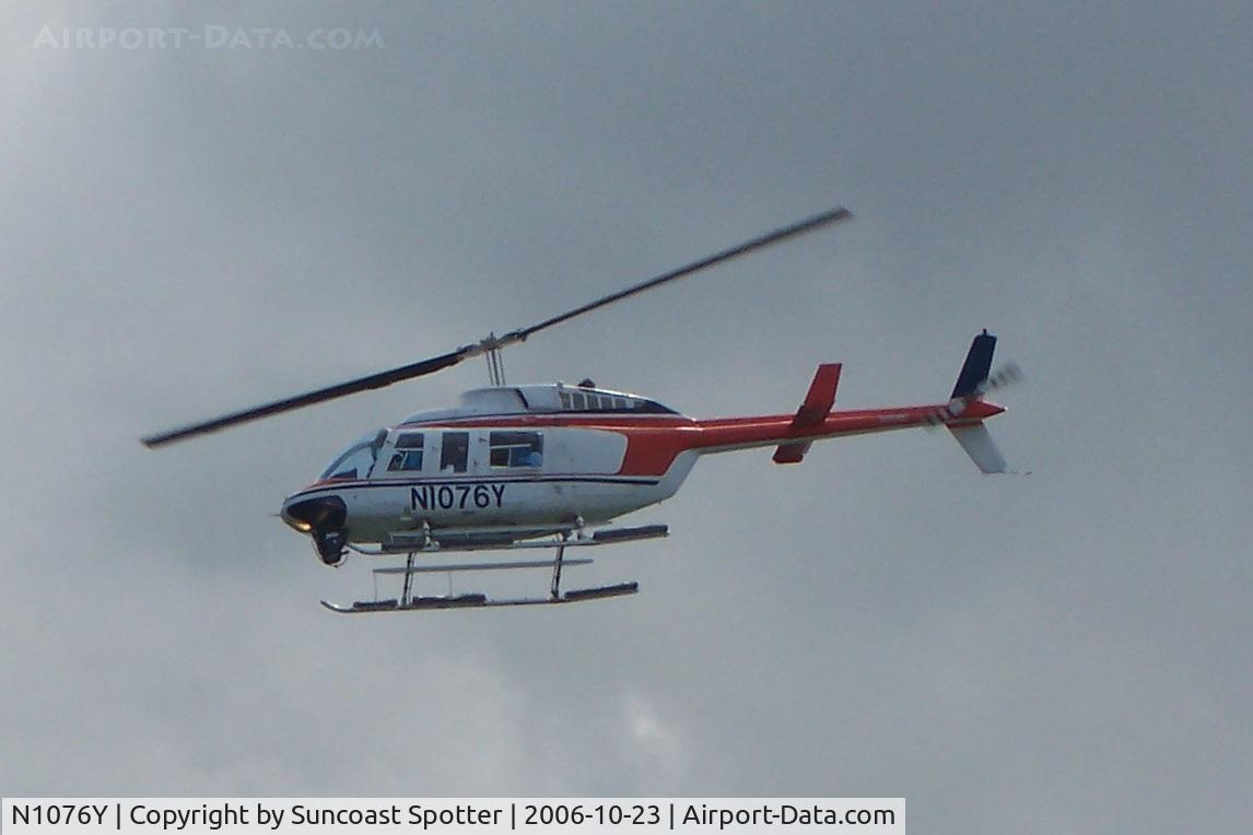 N1076Y, 1980 Bell 206L-1 LongRanger II C/N 45380, Bell LongRanger flies over San Juan harbor