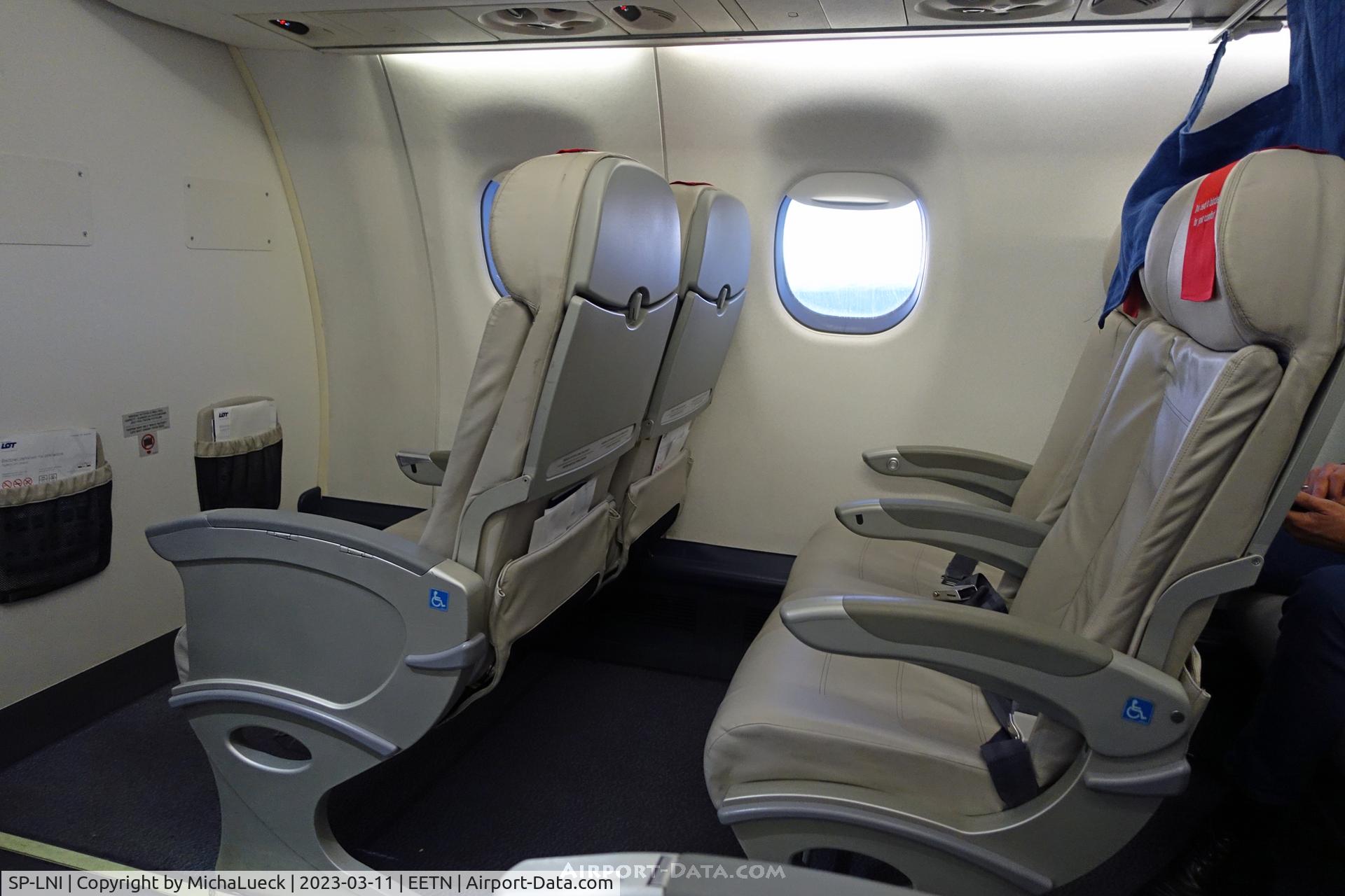 SP-LNI, 2008 Embraer 195LR (ERJ-190-200LR) C/N 19000240, An empty business class on the short hop from TLL to WAW