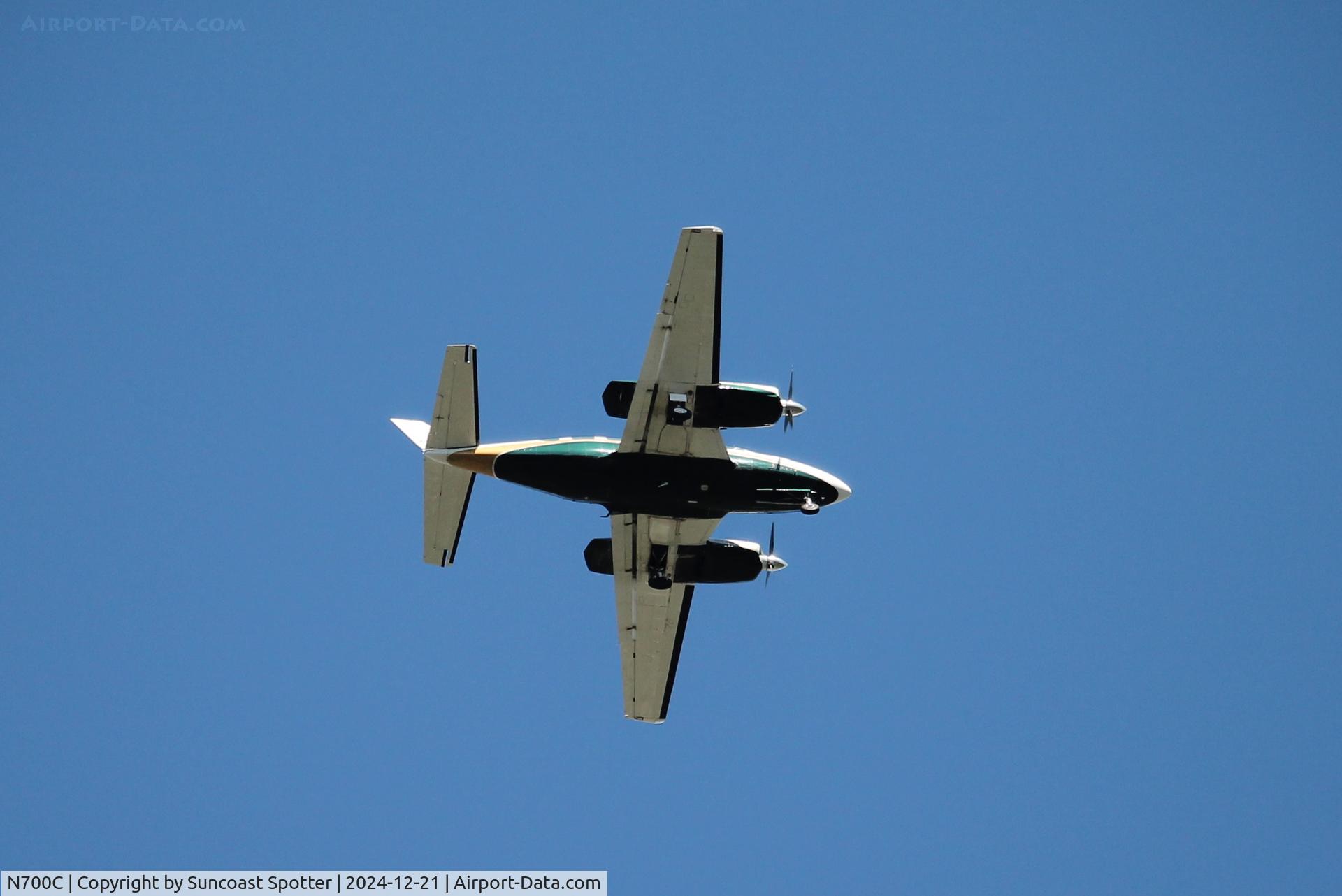 N700C, 1974 Piper PA-31-350 Chieftain C/N 31-7405497, Piper 700C flies over Zoo Miami on approach to Miami Executive Airport following a flight from Naples Municipal Airport