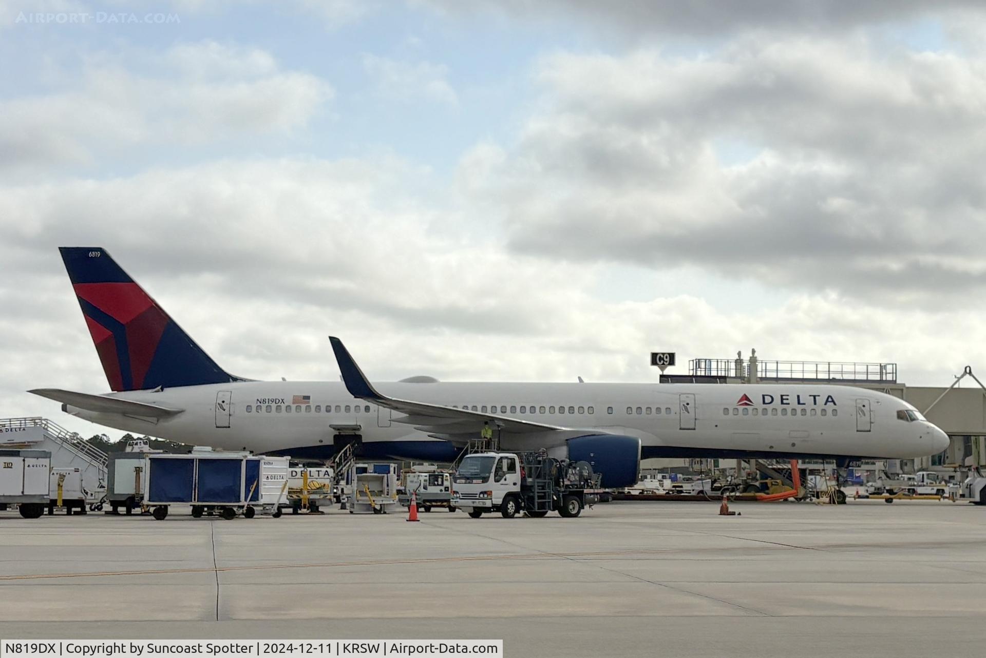 N819DX, 2004 Boeing 757-26D C/N 33959, Delta Flight 1089 sits at Gate C9 at Southwest Florida International Airport preparing for flight to Hartsfield-Jackson Atlanta International Airport