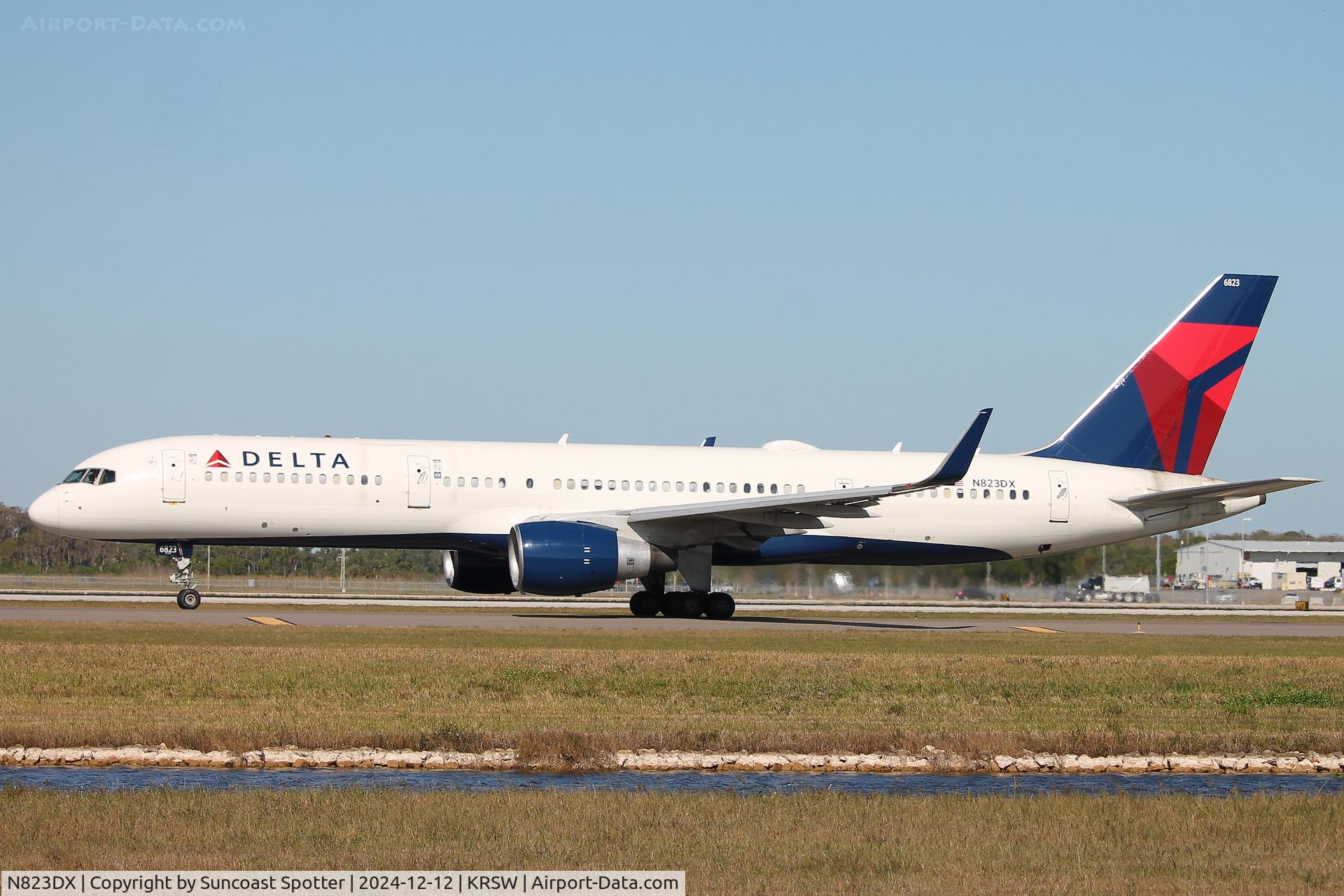 N823DX, 2004 Boeing 757-26D C/N 33967, Delta Flight 1089 taxis at Southwest Florida International Airport prior to flight to Hartsfield-Jackson Atlanta International Airport