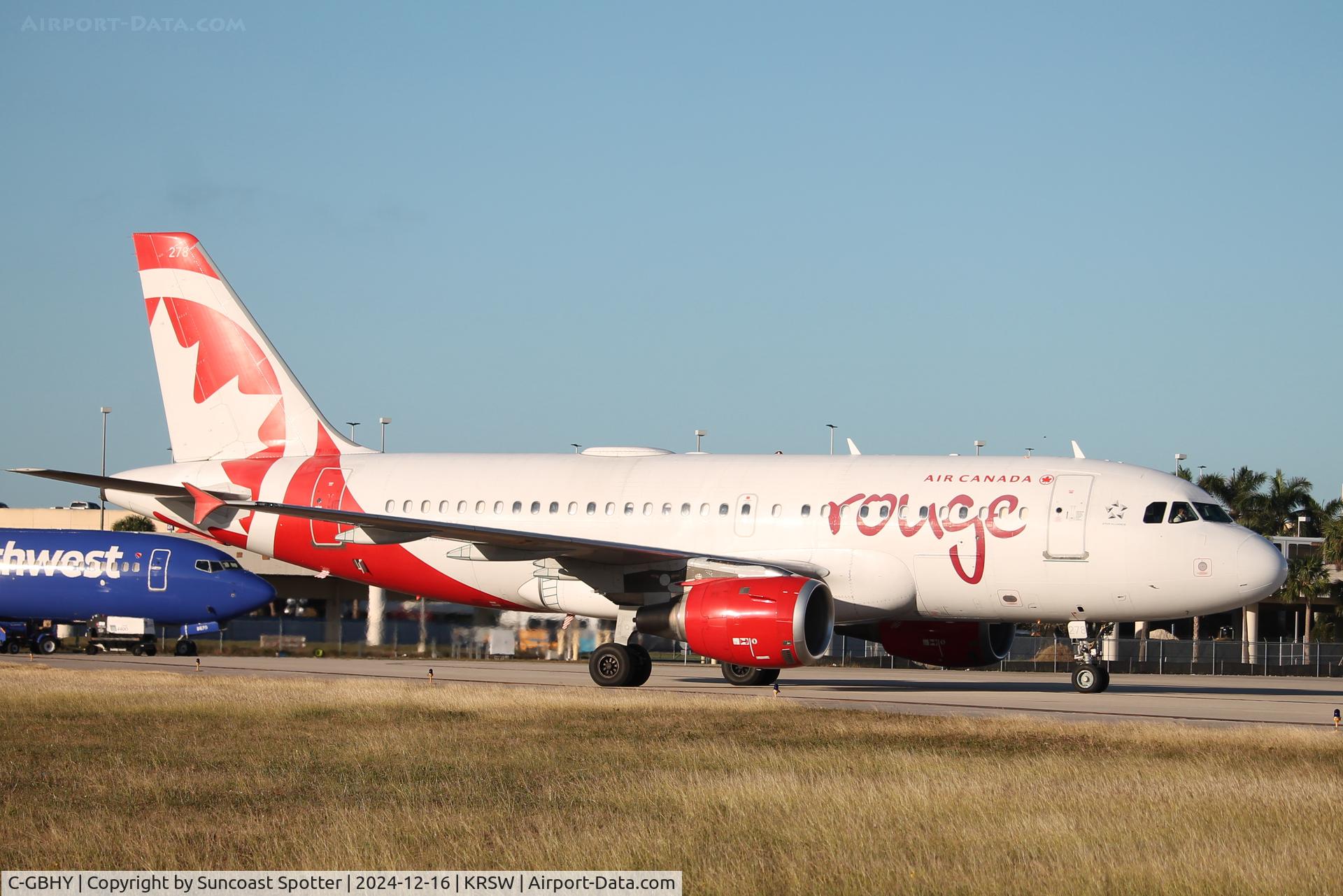 C-GBHY, 1998 Airbus A319-114 C/N 800, Rouge Flight 1663 taxis at Southwest Florida International Airport prior to flight to Toronto-Pearson International Airport