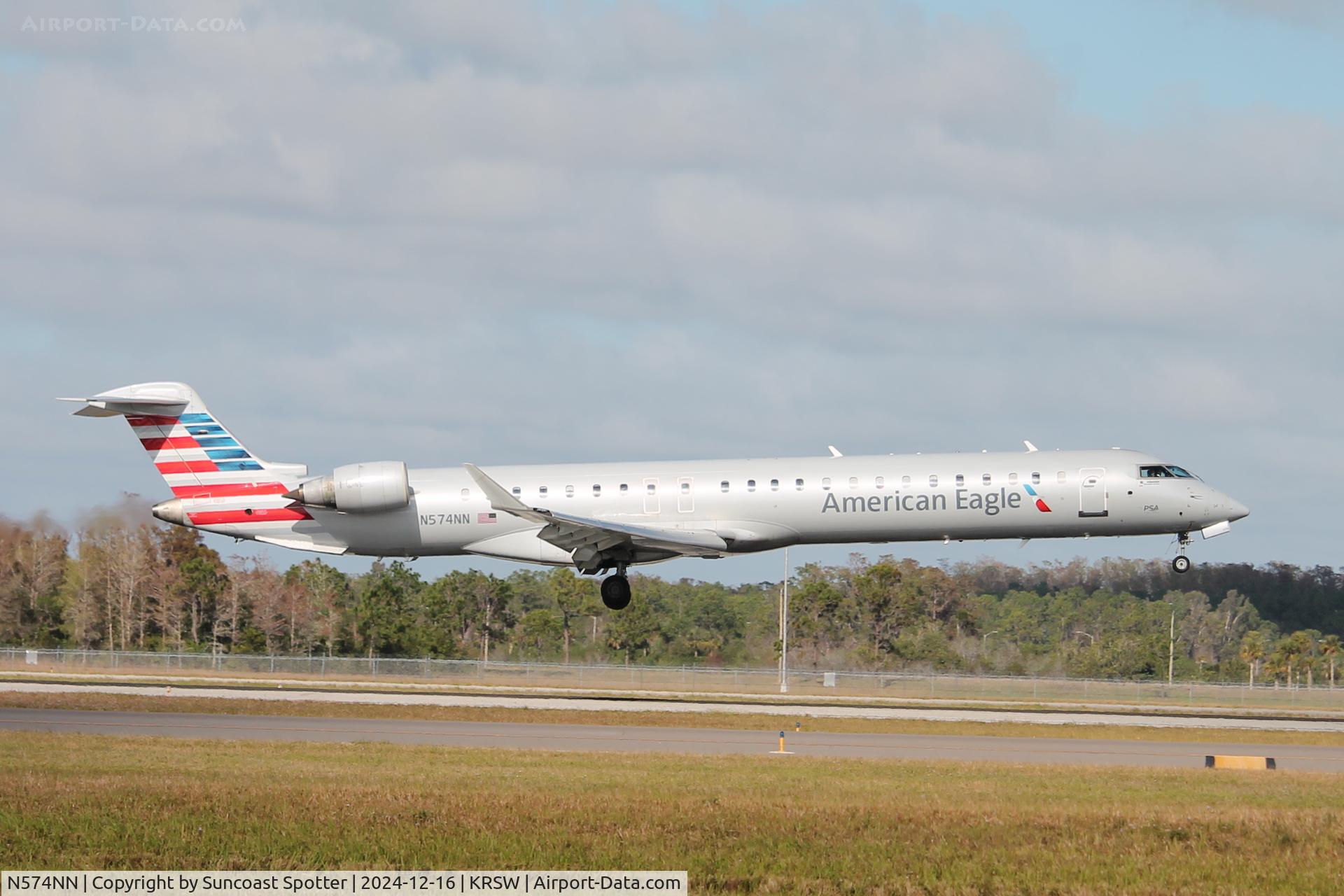 N574NN, 2015 Bombardier CRJ-900ER (CL-600-2D24) C/N 15365, American Flight 5576 operated by PSA arrives on Runway 6 at Southwest Florida International Airport following flight from Reagan National Airport