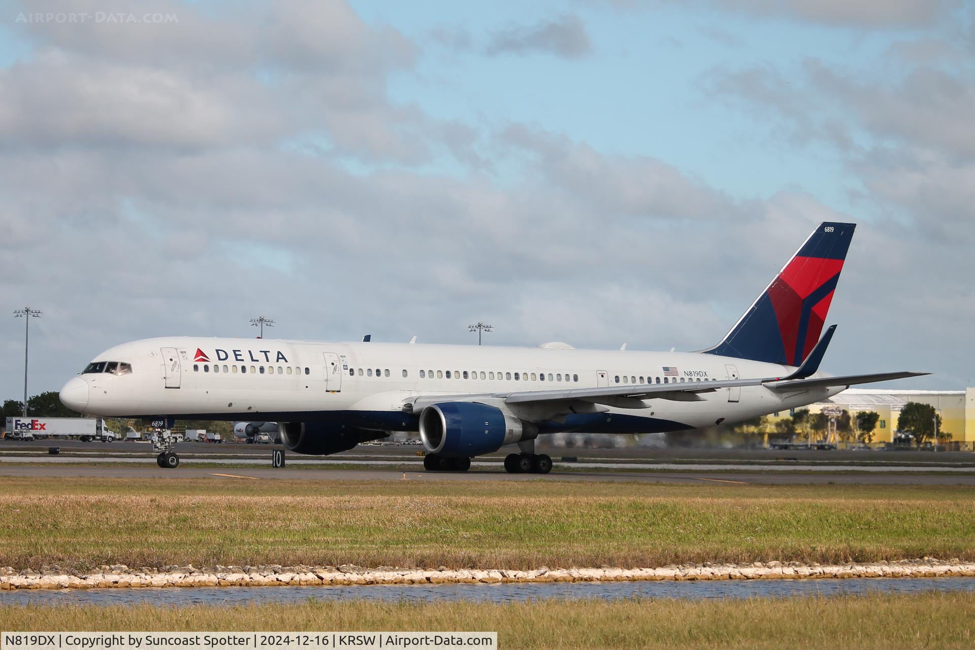 N819DX, 2004 Boeing 757-26D C/N 33959, Delta Flight 1089 taxis at Southwest Florida International Airport prior to flight to Hartsfield-Jackson Atlanta International Airport