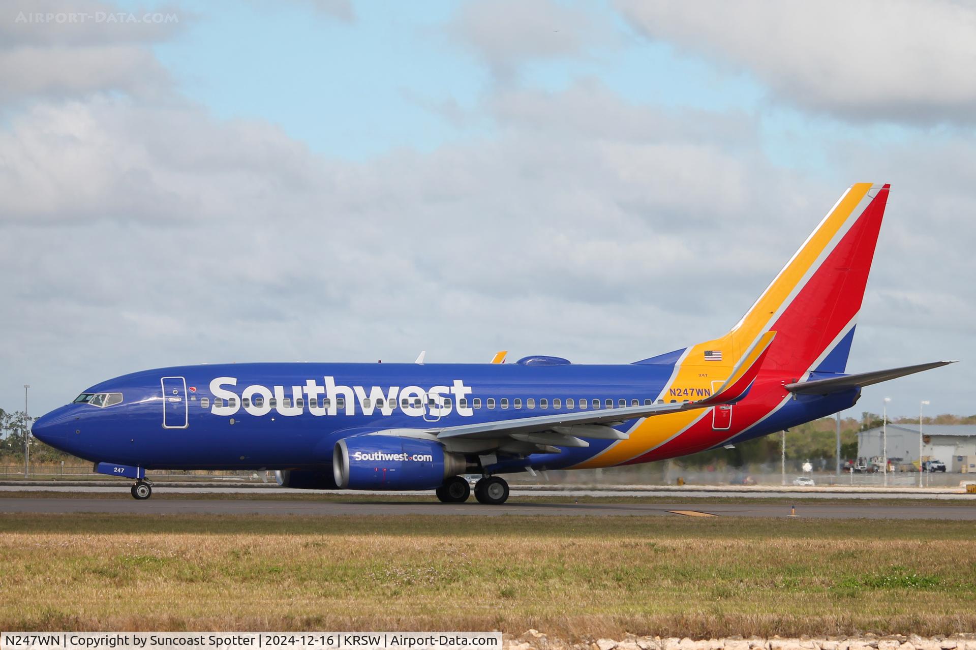N247WN, 2006 Boeing 737-7H4 C/N 32508, Southwest Flight 2328 taxis at Southwest Florida International Airport prior to flight to John Glenn Columbus International Airport