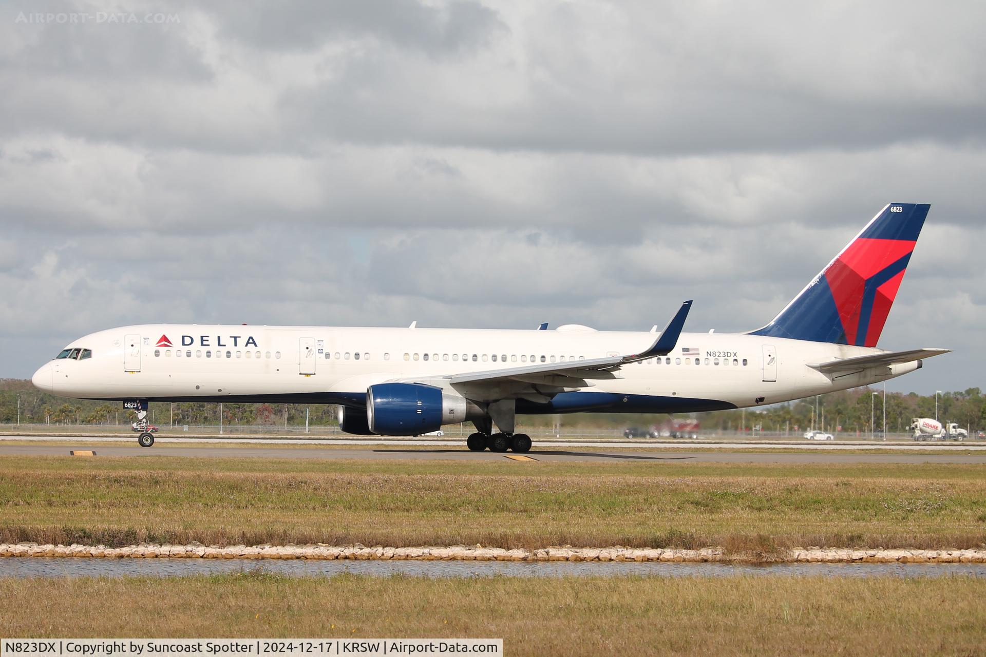 N823DX, 2004 Boeing 757-26D C/N 33967, Delta Flight 1089 taxis at Southwest Florida International Airport prior to flight to Hartsfield-Jackson Atlanta International Airport