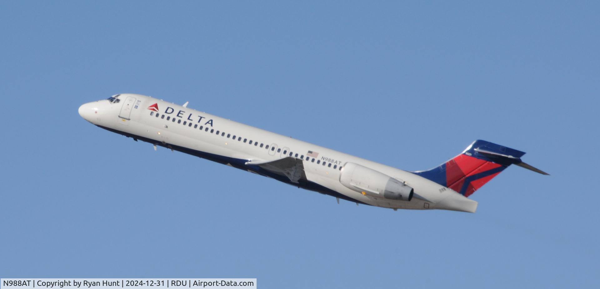 N988AT, 2001 Boeing 717-200 C/N 55068, Steep New Year's Eve departure for this 717.