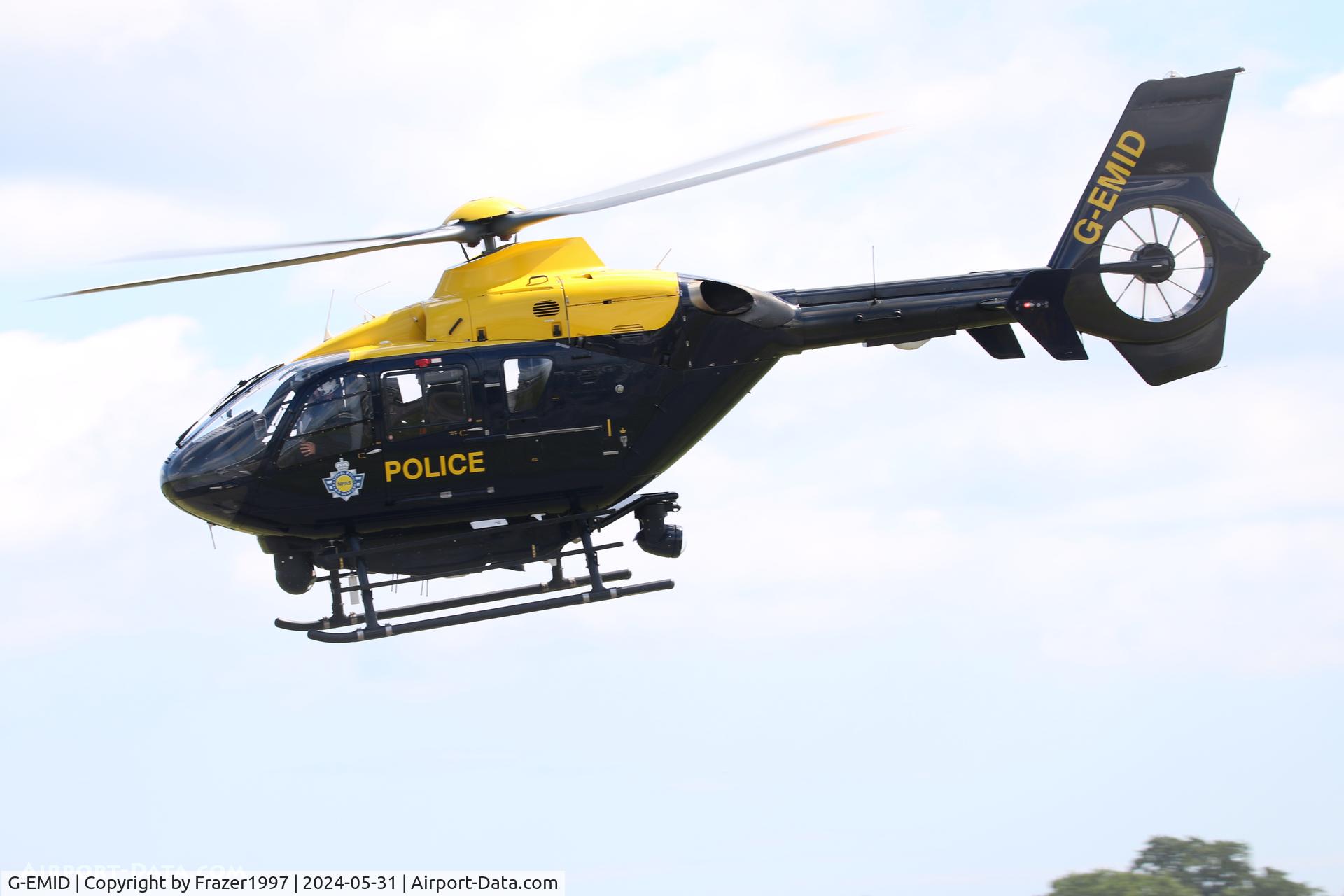 G-EMID, 2006 Eurocopter EC-135P-2+ C/N 0524, G-EMID EC135 operated by NPAS lifting from their base within the grounds of Bournemouth Airport.