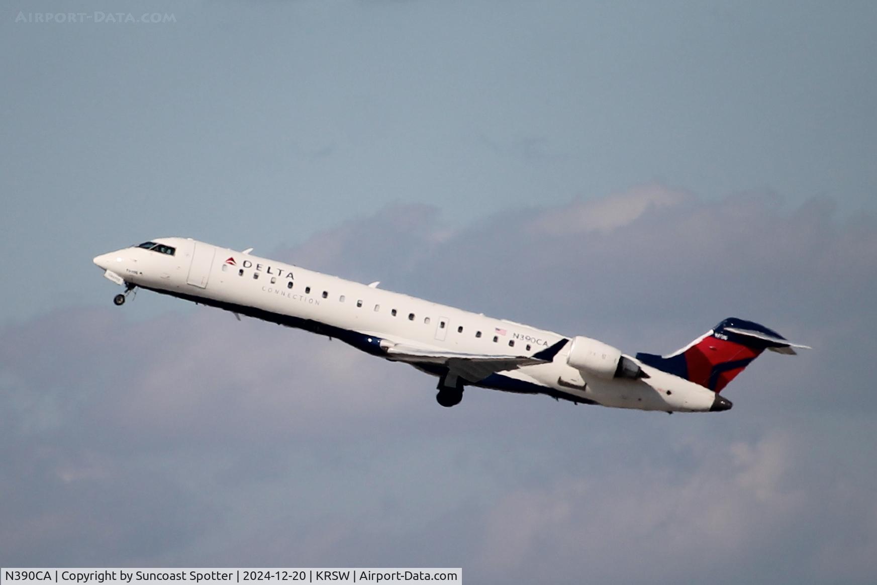 N390CA, 2003 Bombardier CRJ-701ER (CL-600-2C10) Regional Jet C/N 10106, Delta Flight 4860 operated by Endeavor departs Runway 24 at Southwest Florida International Airport enroute to Key West International Airport