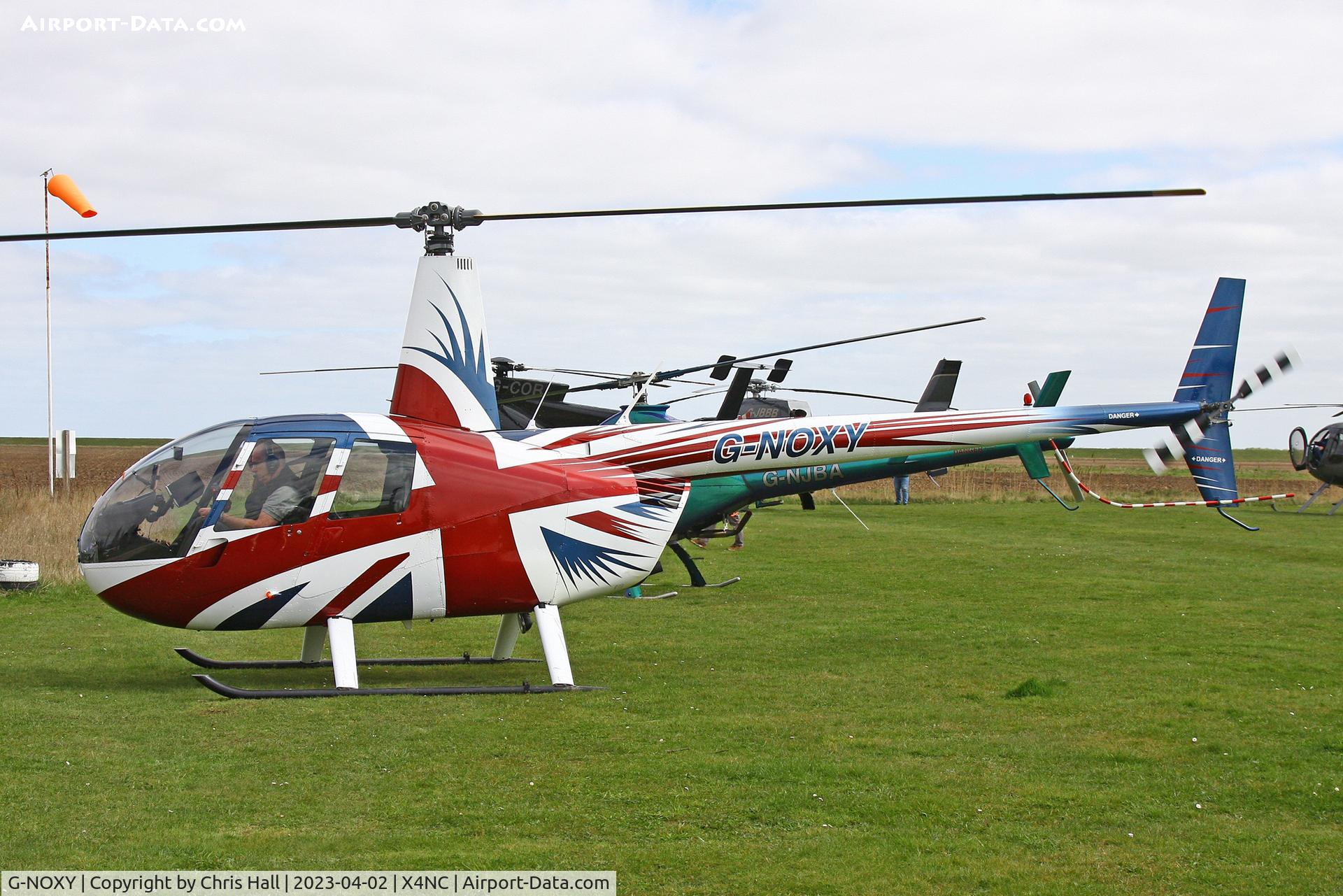 G-NOXY, 2004 Robinson R44 Raven C/N 1421, North Coates