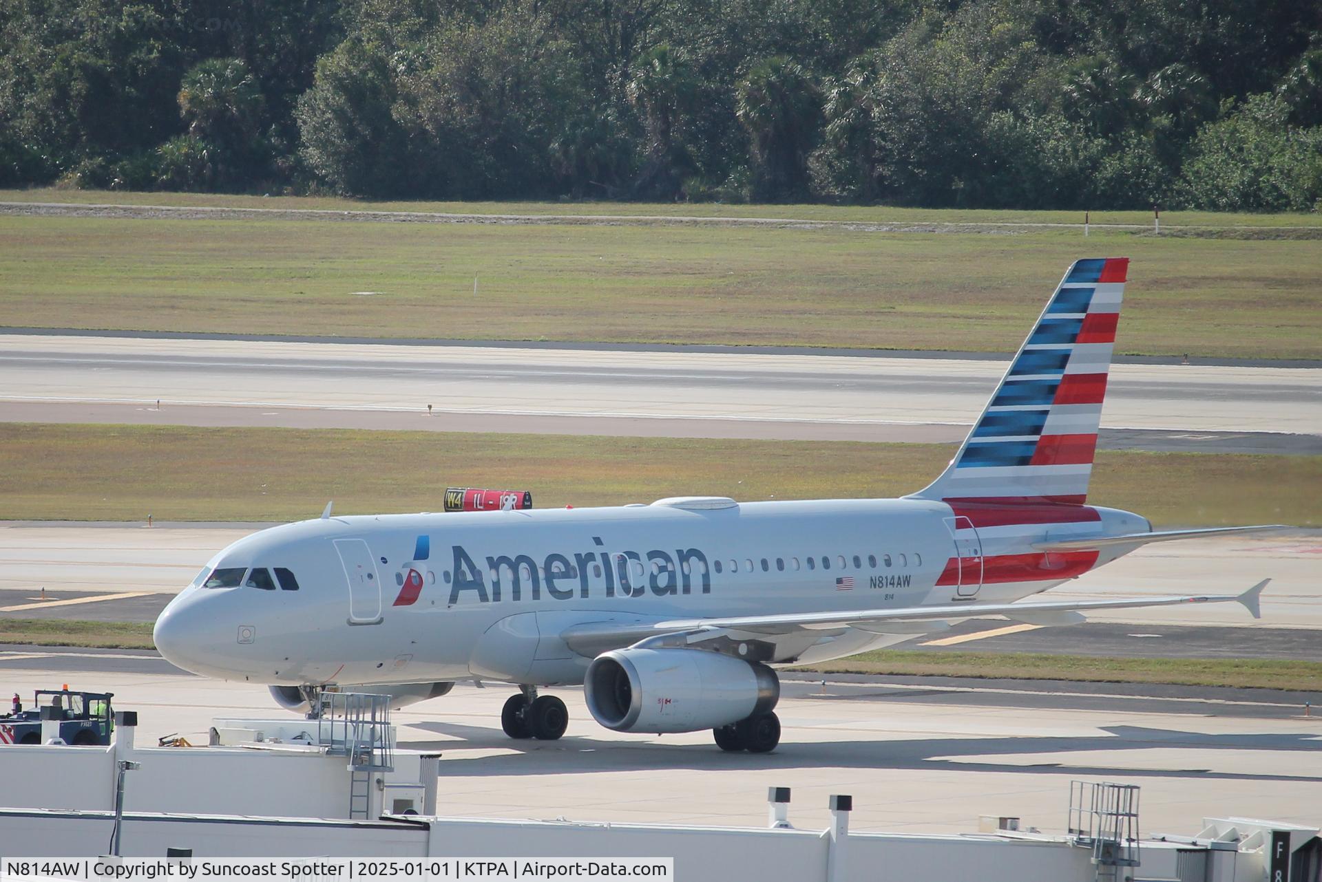 N814AW, 2000 Airbus A319-132 C/N 1281, American Flight 2524 pushes back at Tampa International Airport prior to flight to Reagan National Airport