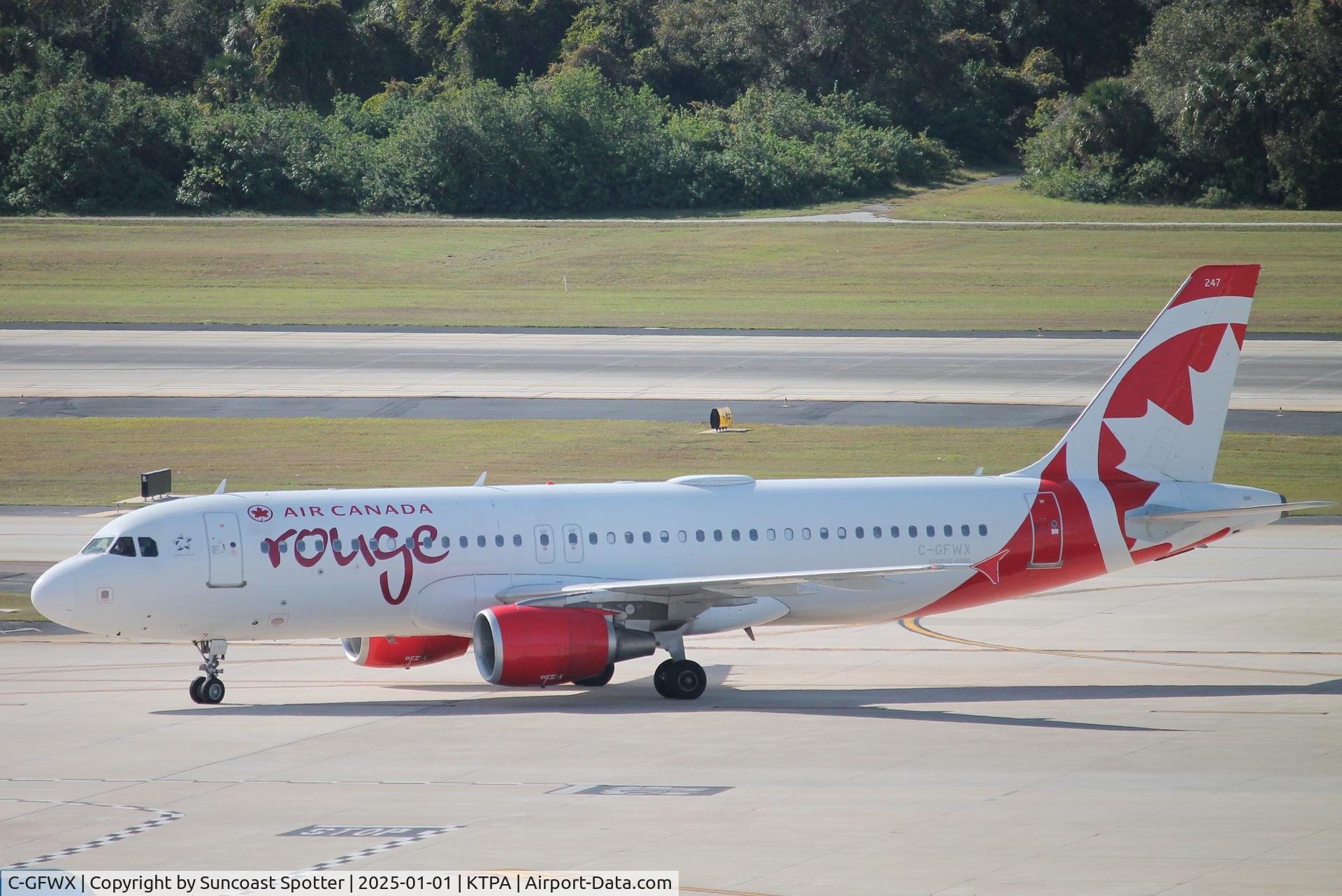 C-GFWX, 2007 Airbus A320-214 C/N 3304, Rouge Flight 1656 taxis to gate at Tampa International Airport following flight from Toronto-Pearson International Airport