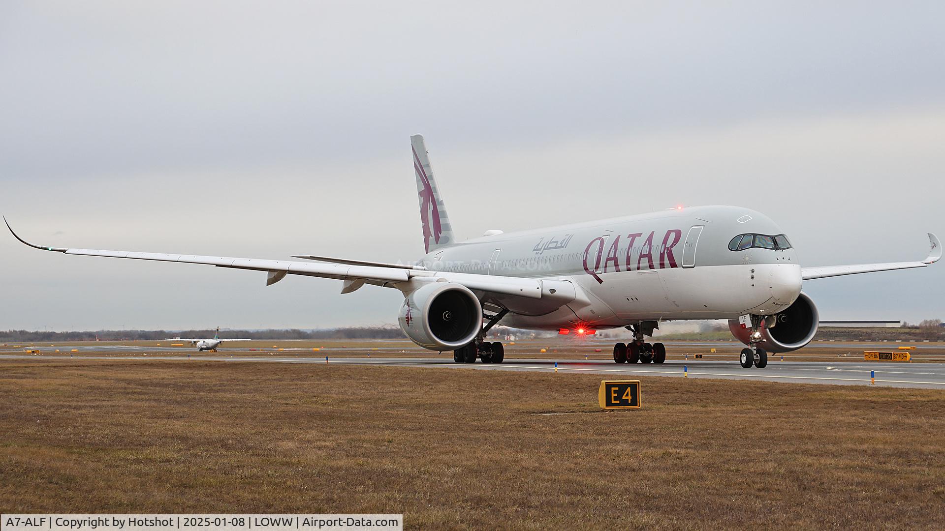 A7-ALF, 2015 Airbus A350-941 C/N 011, Flashing while taxiing on E to holding point runway 34.