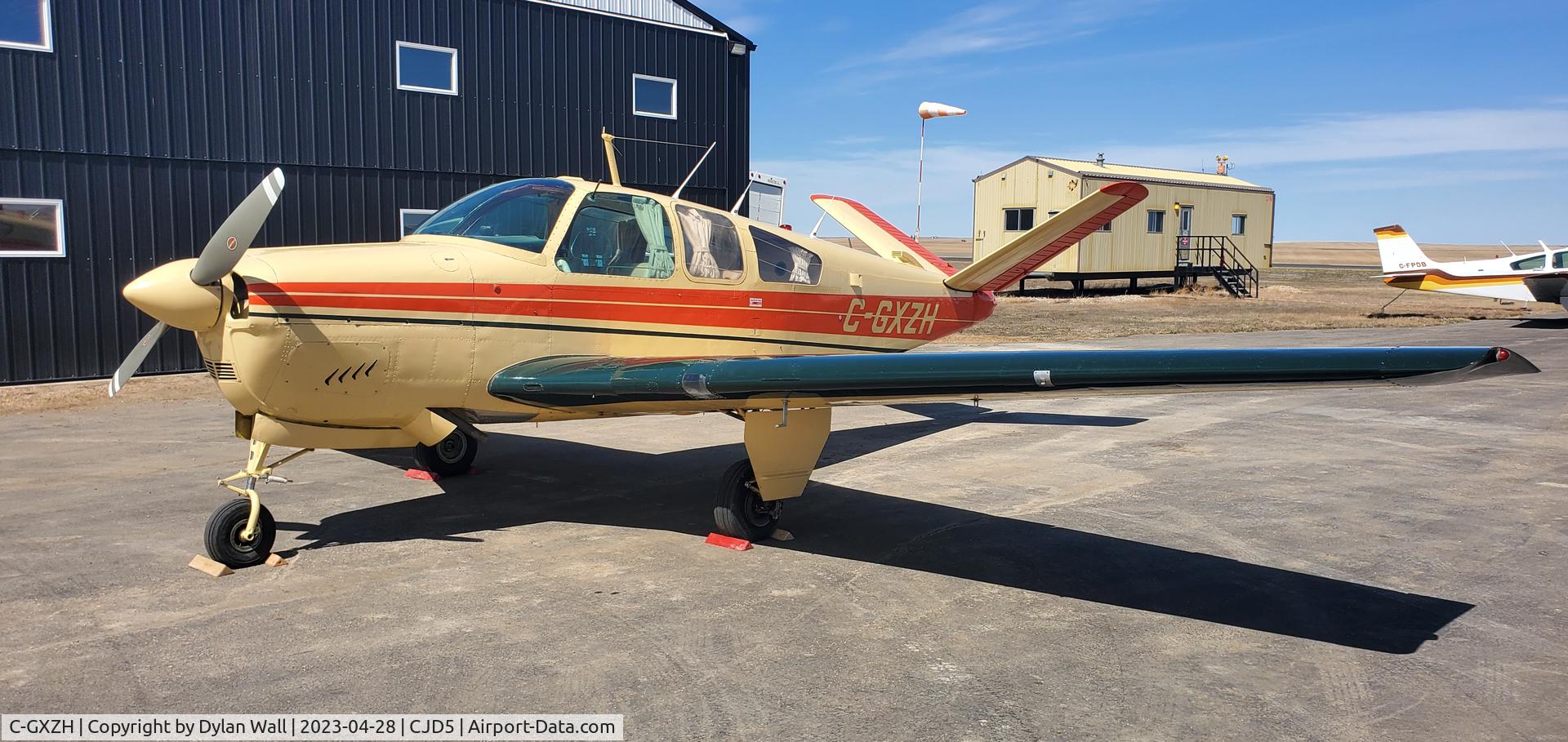 C-GXZH, 1950 Beech B35 C/N D 2281, XZH sitting infront of the hangar