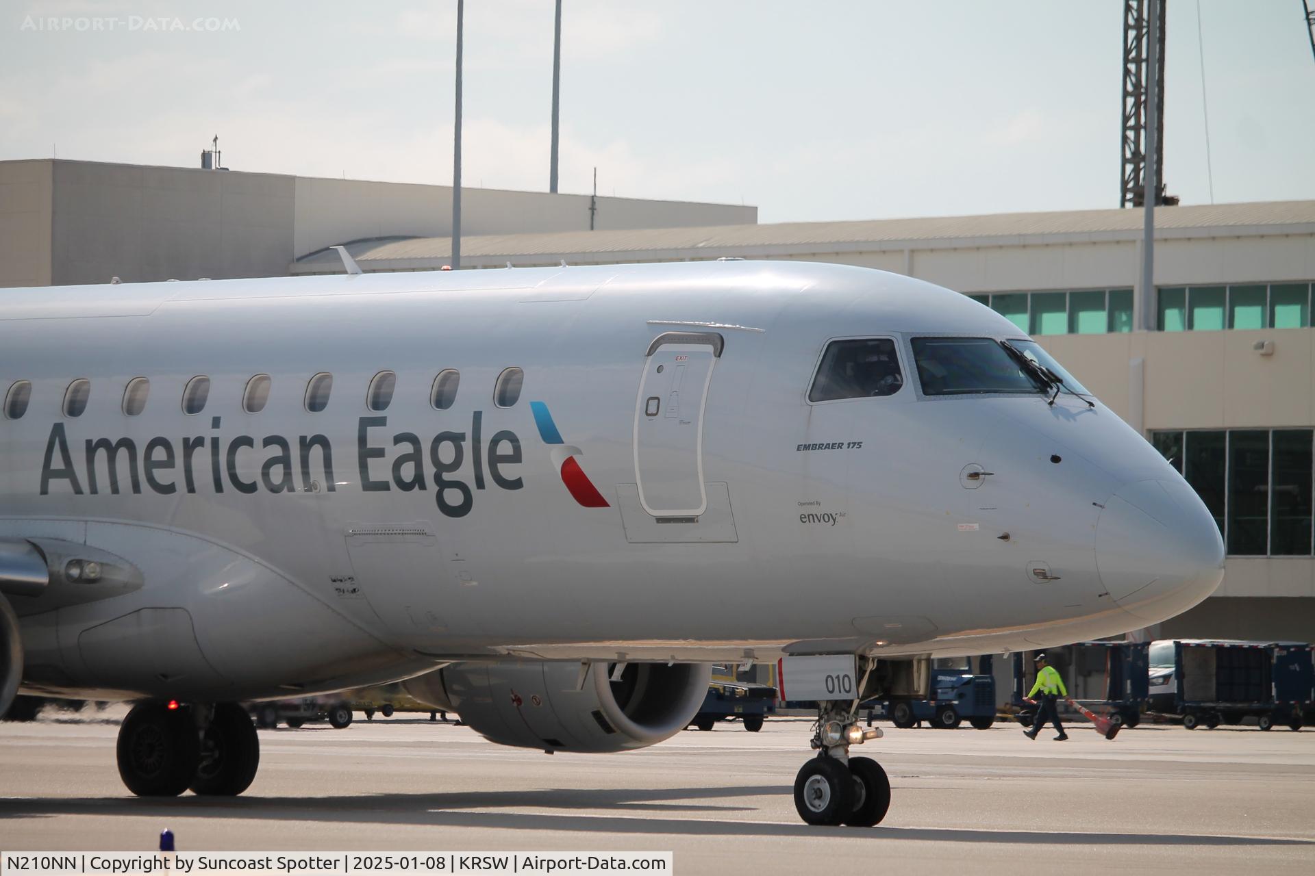 N210NN, 2015 Embraer 175LR (ERJ-170-200LR) C/N 17000500, American Flight 3785 operated by Envoy taxis at Southwest Florida International Airport prior to fight to Reagan National Airport