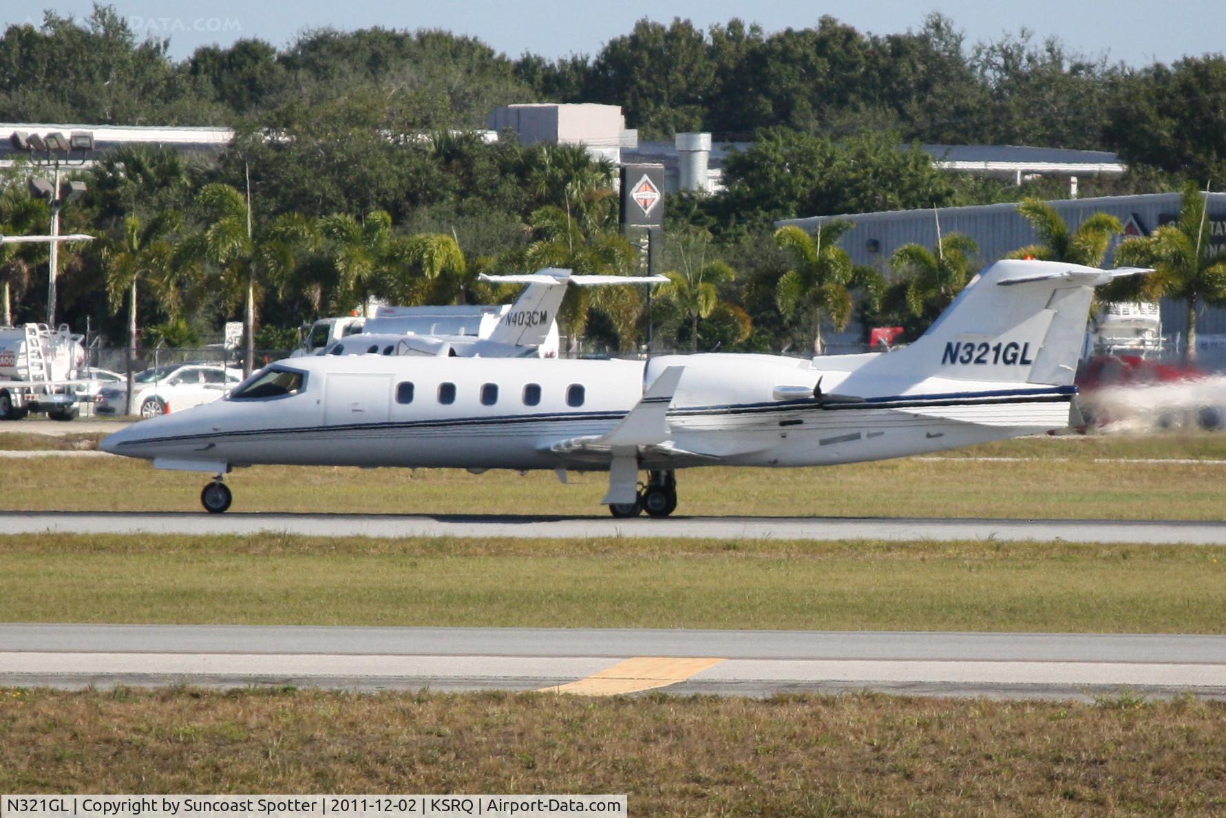 N321GL, 2000 Learjet 31A C/N 216, N321GL departing Runway 32 at Sarasota-Bradenton International Airport