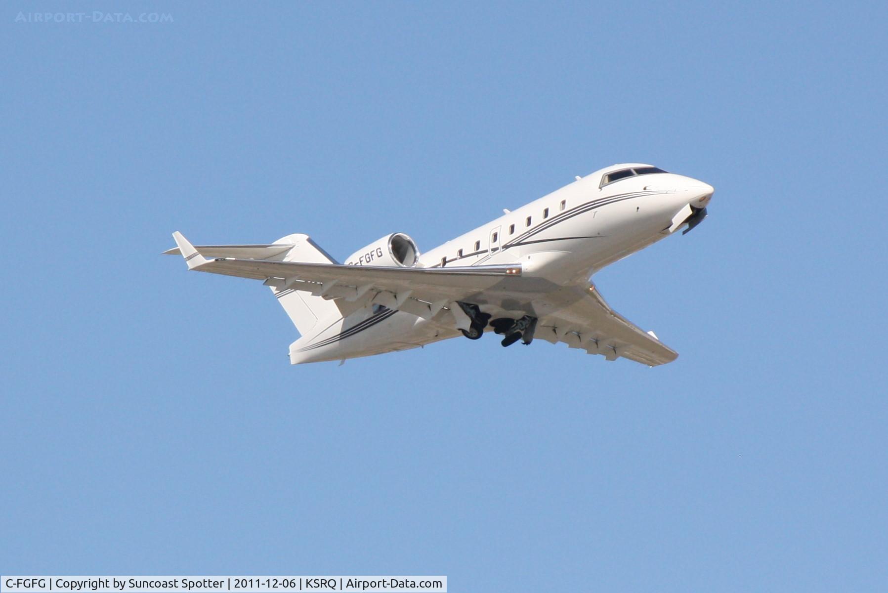 C-FGFG, 1998 Bombardier Challenger 604 (CL-600-2B16) C/N 5383, Canadair Challenger CFGFG departs from Runway 14 at Sarasota-Bradenton International Airport