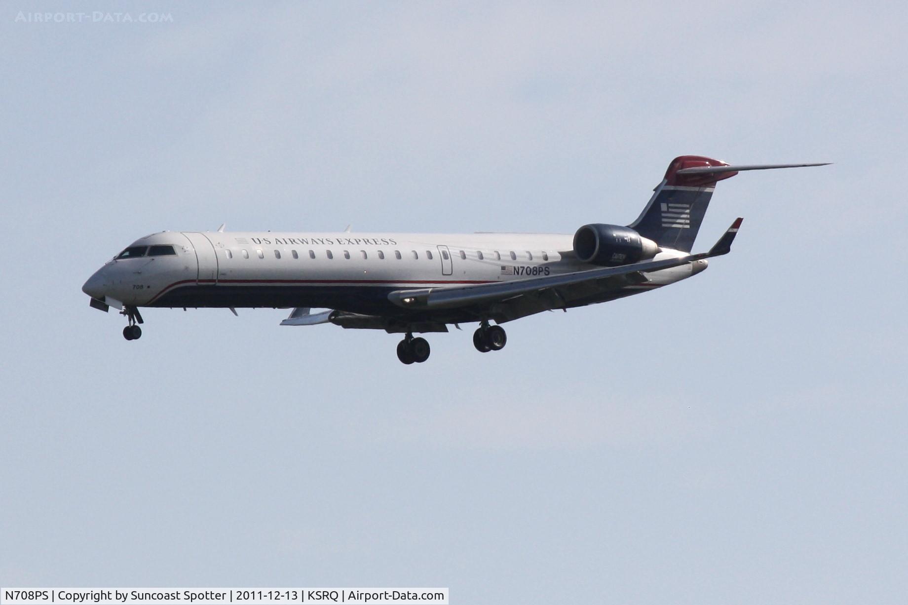 N708PS, 2004 Bombardier CRJ-701 (CL-600-2C10) Regional Jet C/N 10160, PSA Airlines/US Airways Express CRJ-700 on approach to Runway 32 at Sarasota-Bradenton International Airport