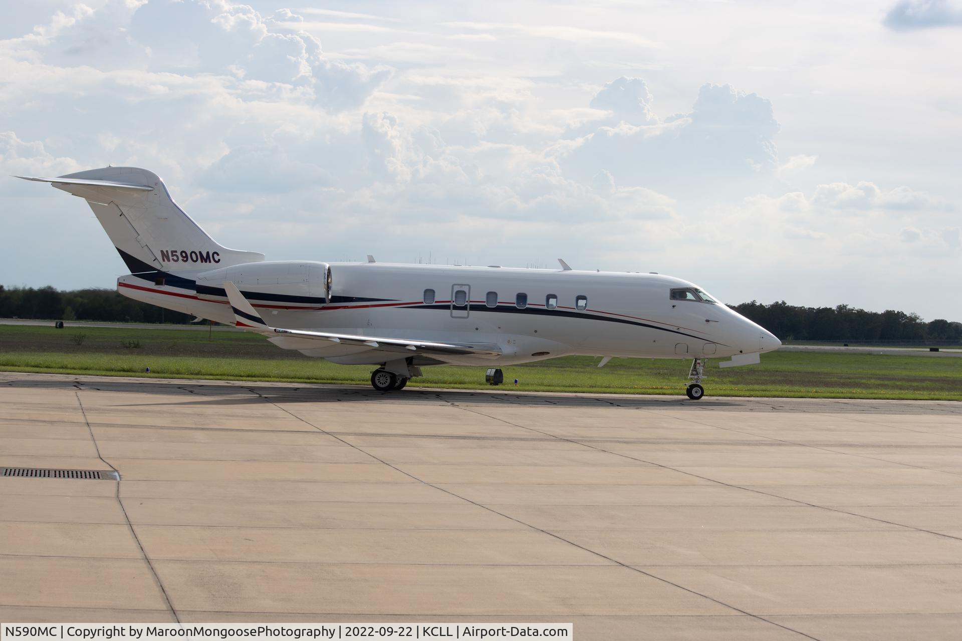N590MC, 2004 Bombardier BD-100-1A10 Challenger 300 C/N 20027, N590MC taxing after landing at KCLL