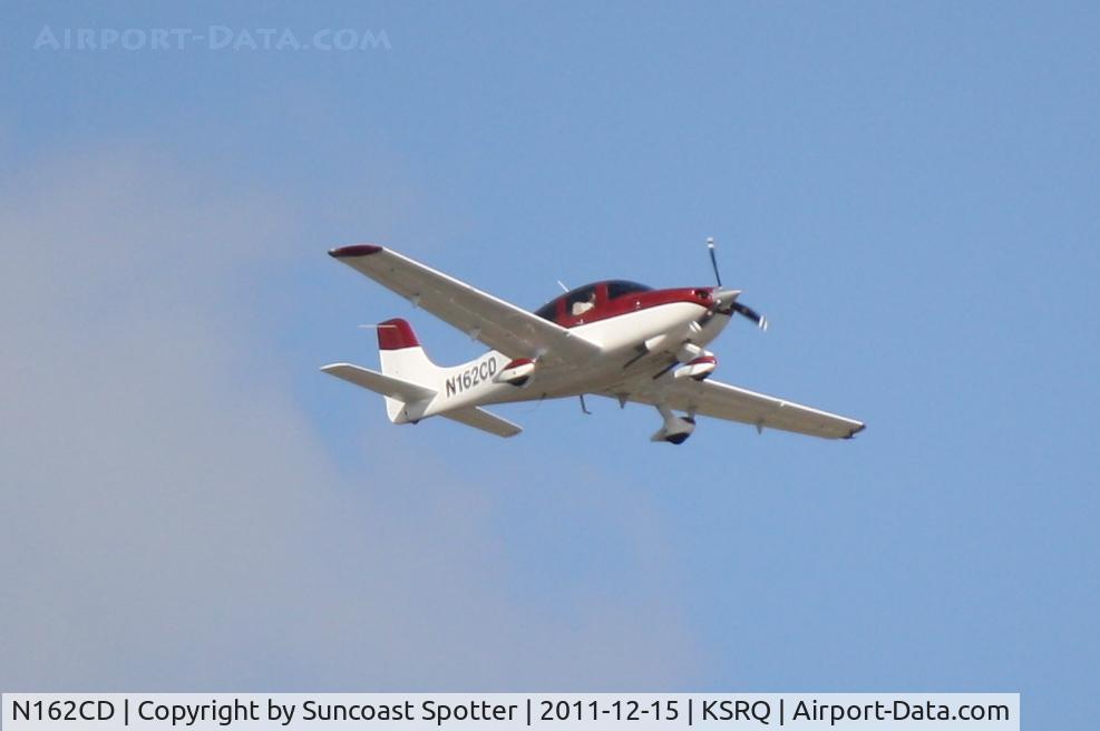 N162CD, 2000 Cirrus SR20 C/N 1066, N162CD departs Runway 14 at Sarasota-Bradenton International Airport