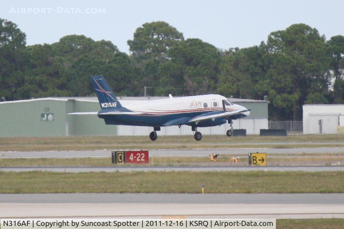 N316AF, 1980 Embraer EMB-110P1 Bandeirante C/N 110.271, Agape Flights  arrives on Runway 4 at Sarasota-Bradenton International Airport following a flight from La Isabela International Airport