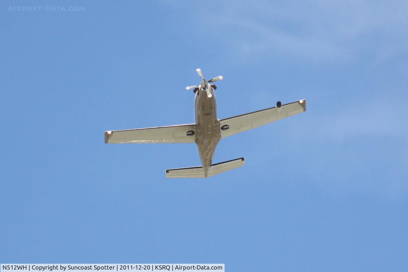 N512WH, 2005 Socata TBM-700 C/N 340, Socata TBM-700 departs Runway 14 at Sarasota-Bradenton International Airport enroute to Burnet Municipal Airport
