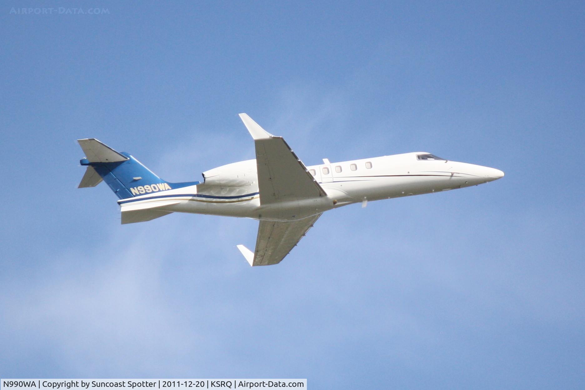 N990WA, Learjet 45 C/N 2122, Wal-Mart Lear Jet departs Runway 14 at Sarasota-Bradenton International Airport