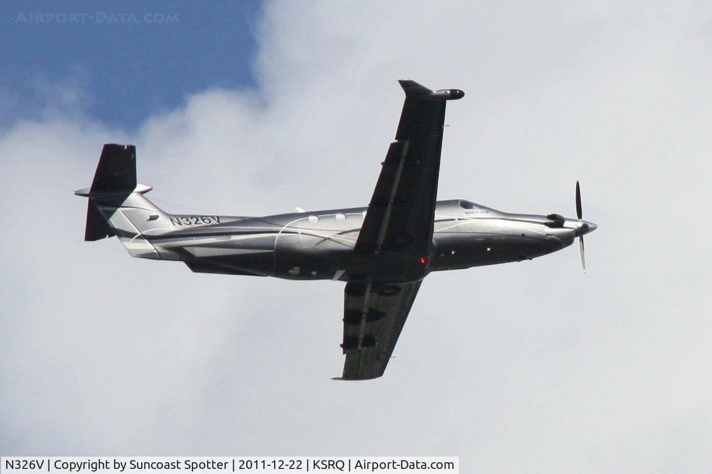 N326V, 2006 Pilatus PC-12/47 C/N 733, N326V departs Runway 14 at Sarasota-Bradenton International Airport enroute to Lawrence Municipal Airport