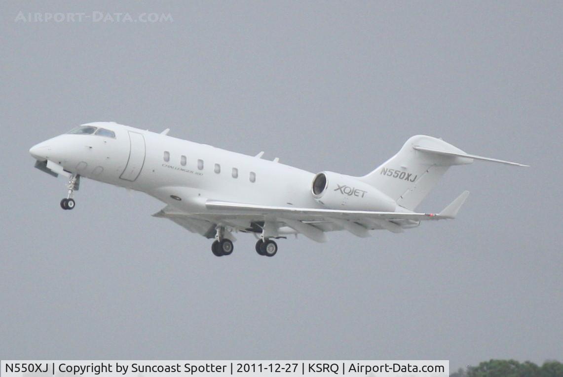 N550XJ, 2011 Bombardier Challenger 300 (BD-100-1A10) C/N 20323, N550XJ departs Runway 22 at Sarasota-Bradenton International Airport enroute to Francis S Gabreski Airport