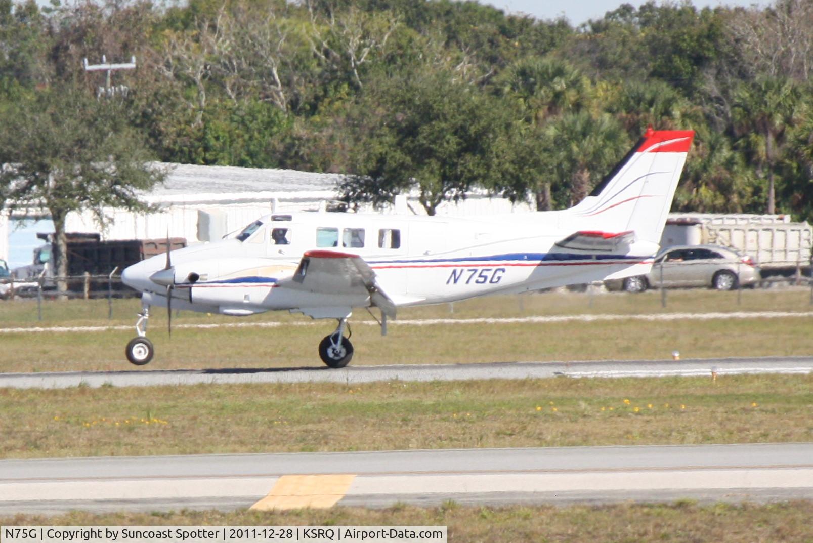 N75G, 1967 Beech U-21A Ute C/N LM-83, Beechcraft King Air 90 arrives on Runway 32 at Sarasota-Bradenton International Airport