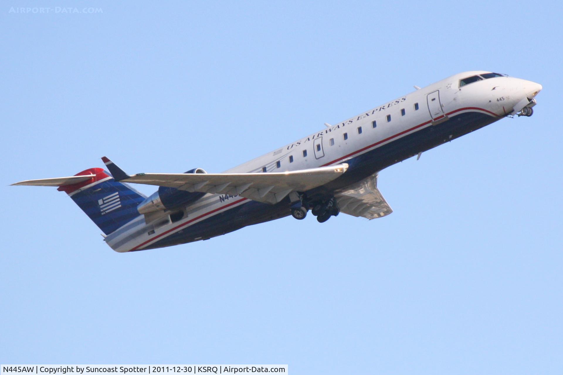 N445AW, 2003 Bombardier CRJ-200LR (CL-600-2B19) C/N 7804, Air Wisconsin/US Airways Express Flight 4031 departs Runway 14 at Sarasota-Bradenton International Airport enroute to Charlotte/Douglas International Airport