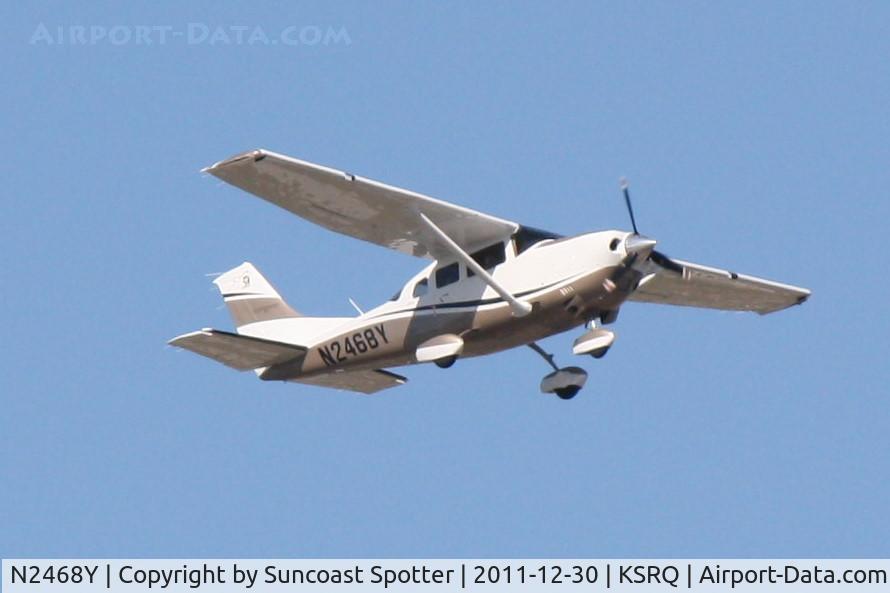 N2468Y, Cessna T206H Turbo Stationair C/N T20609009, N2468Y departs Runway 14 at Sarasota-Bradenton International Airport enroute to North Palm Beach County General Aviation