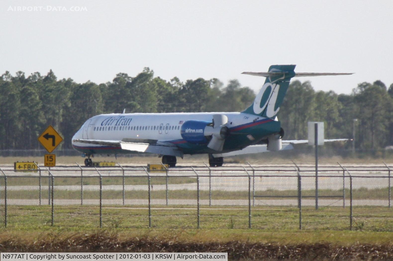 N977AT, 2002 Boeing 717-200 C/N 55036, AirTran Flight 1049 arrives on Runway 6 at Southwest Florida International Airport following a flight from Dulles International Airport