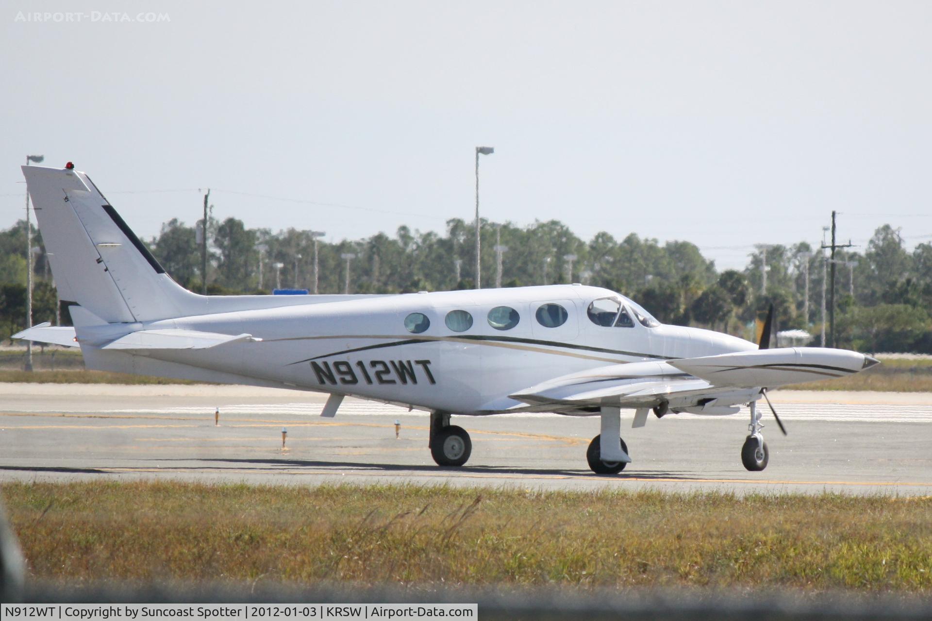 N912WT, 1977 Cessna 340A C/N 340A0353, N912WT taxis for departure at Southwest Florida International Airport prior to a flight to Greenville/Spartanburg International Airport