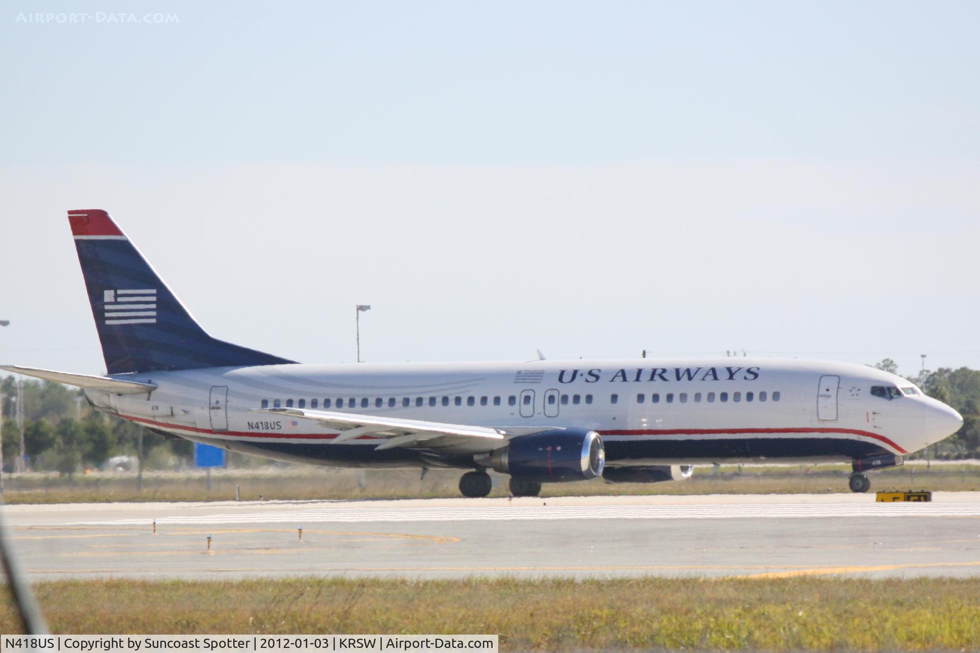 N418US, 1989 Boeing 737-401 C/N 23985, US Airways Flight 1972 taxis for departure at Southwest Florida International Airport prior to a flight to Charlotte/Douglas International Airport